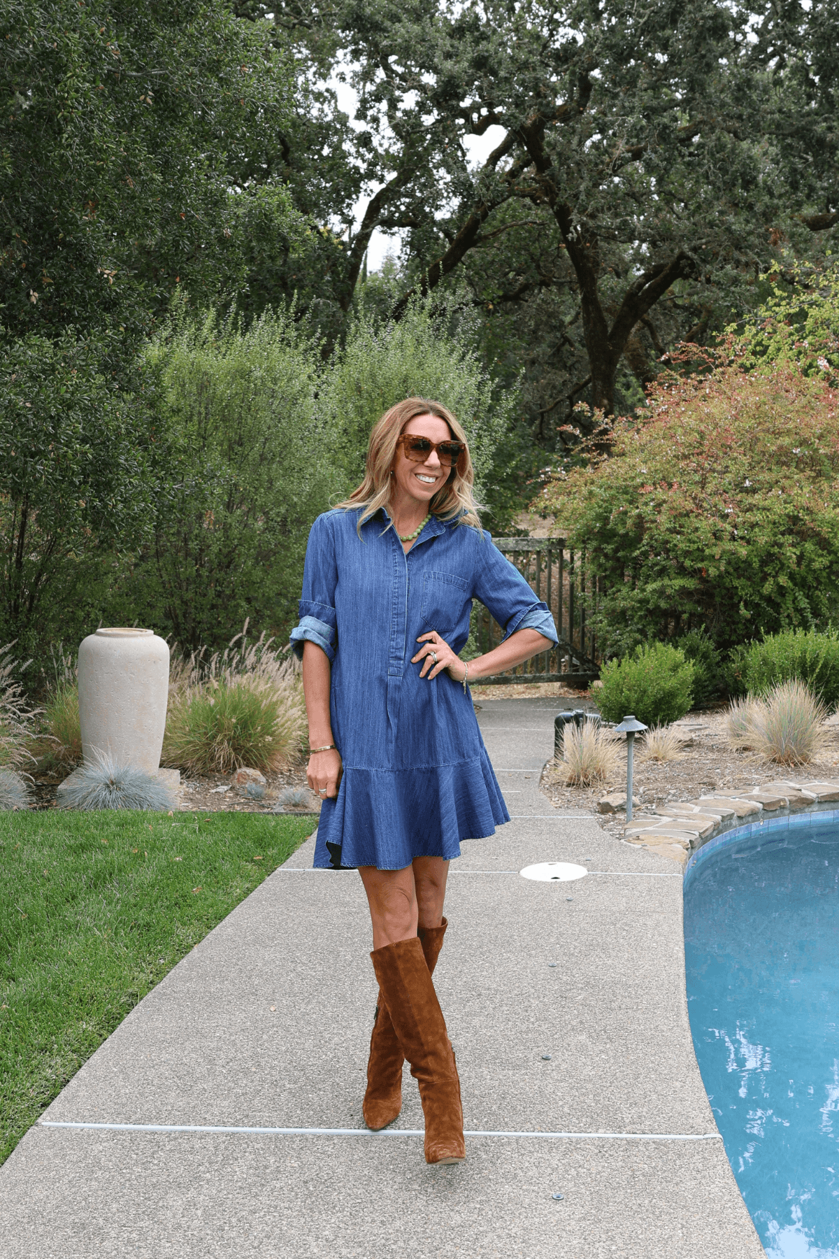 Nutmeg suede knee-high boots with a block heel and pull-on shaft.