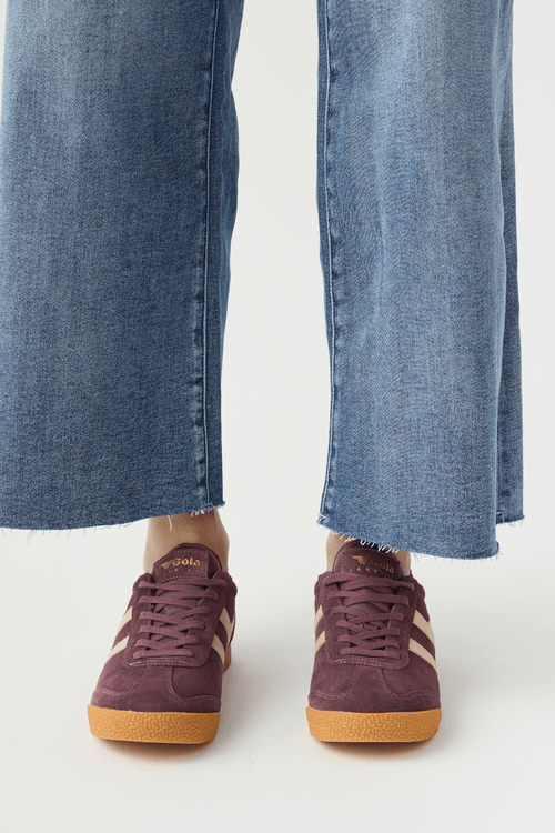 Cocoa brown lace-up sneakers, front view, with white stripes and gum rubber sole