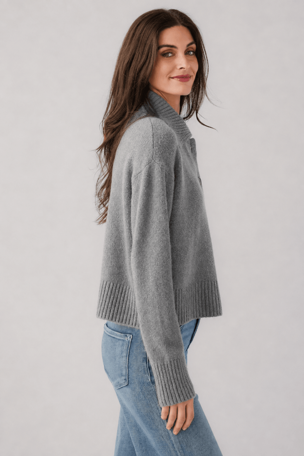 Grey knit polo sweater side view, turn-down collar and button placket, long sleeves