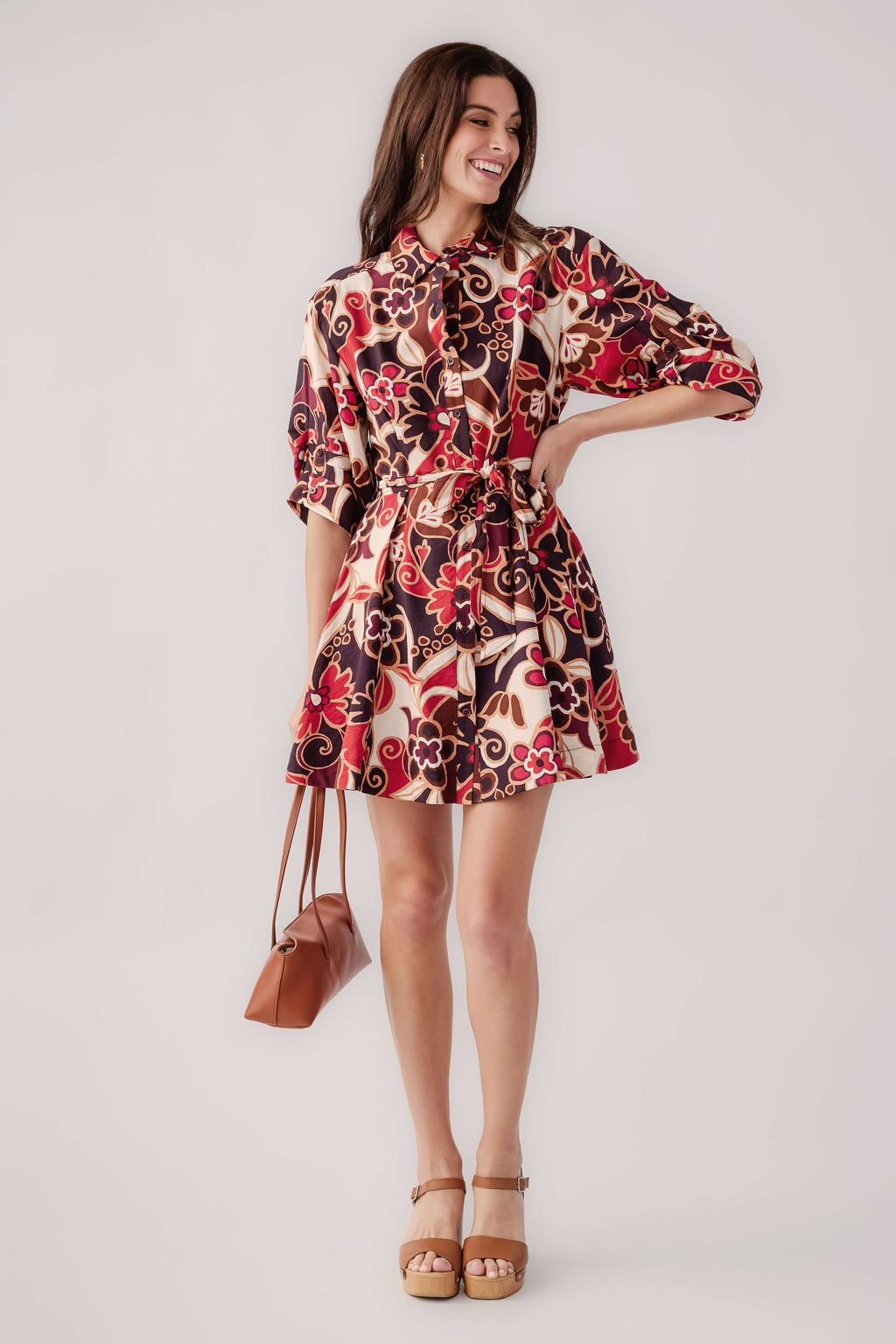 Abstract floral shirt dress with belted waist and 3/4 sleeves, front view, purple-red-cream pattern