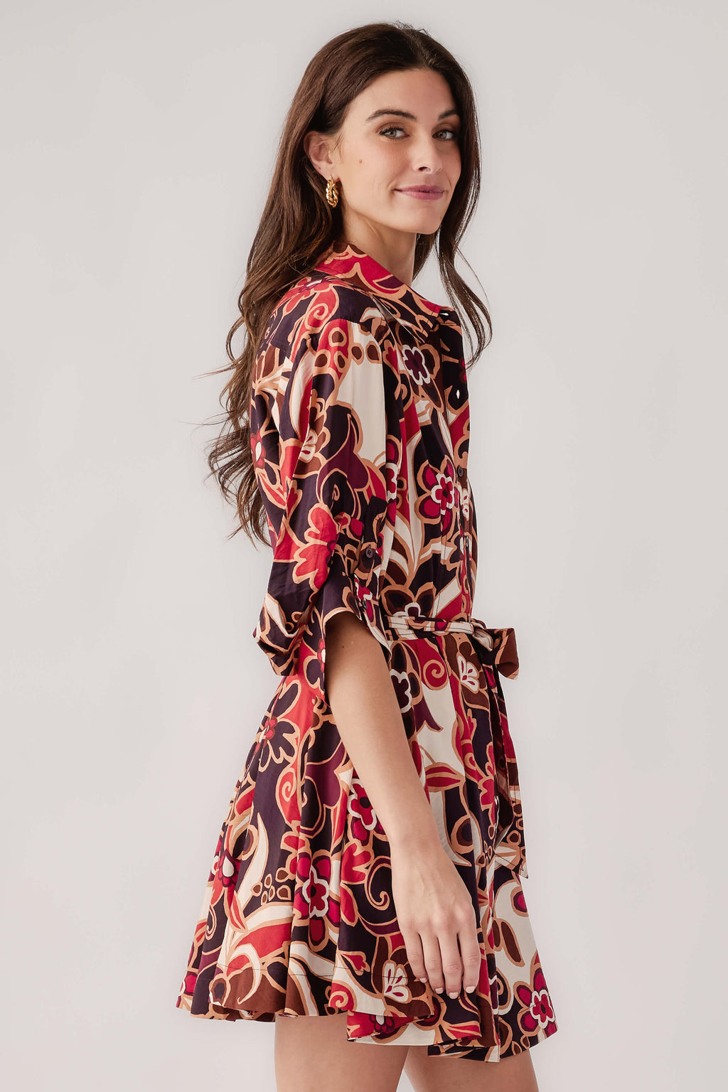 Abstract floral shirt dress, side view, belted waist, 3/4 sleeves, purple-red-cream