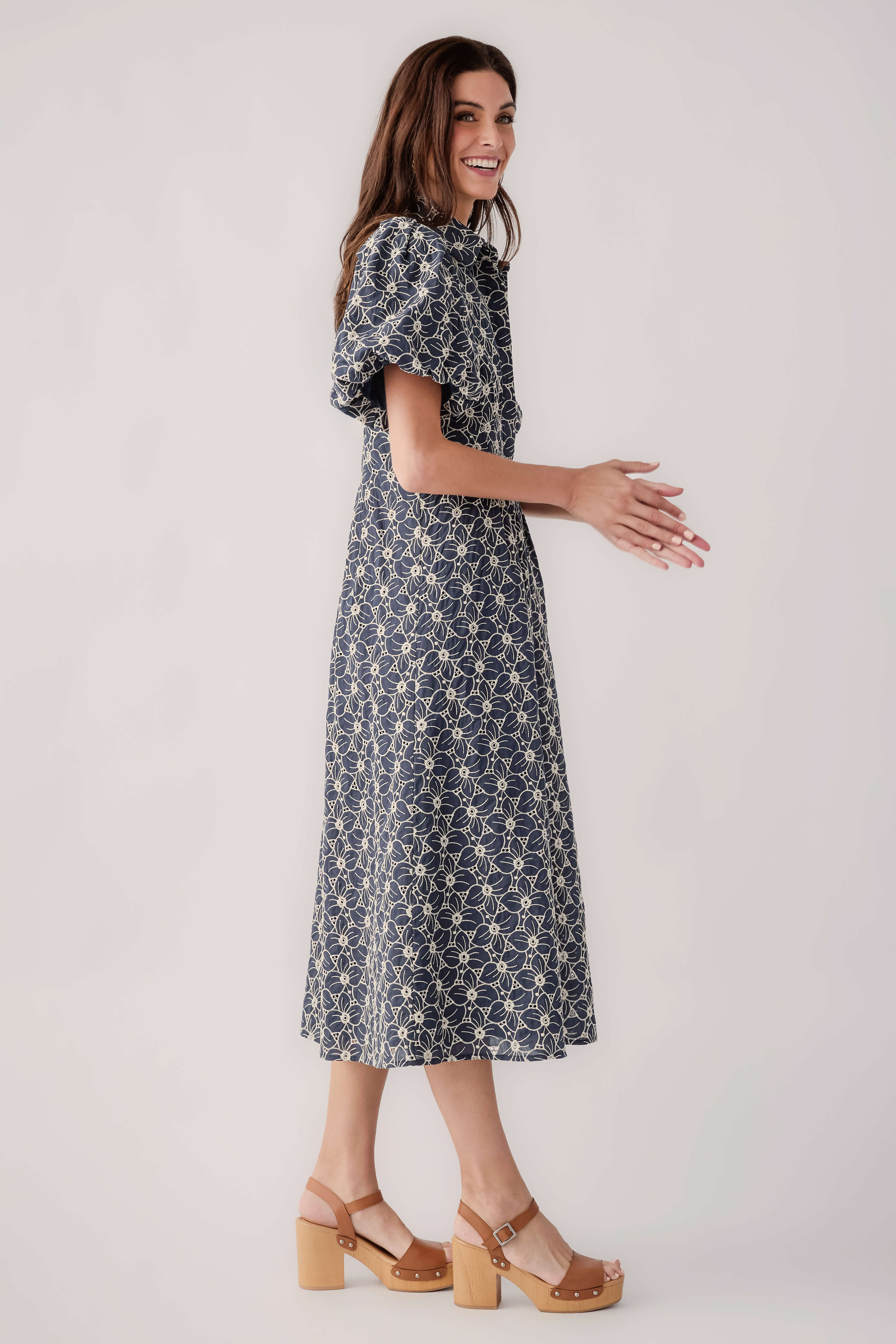 Navy floral eyelet midi dress, side view, short flutter sleeves