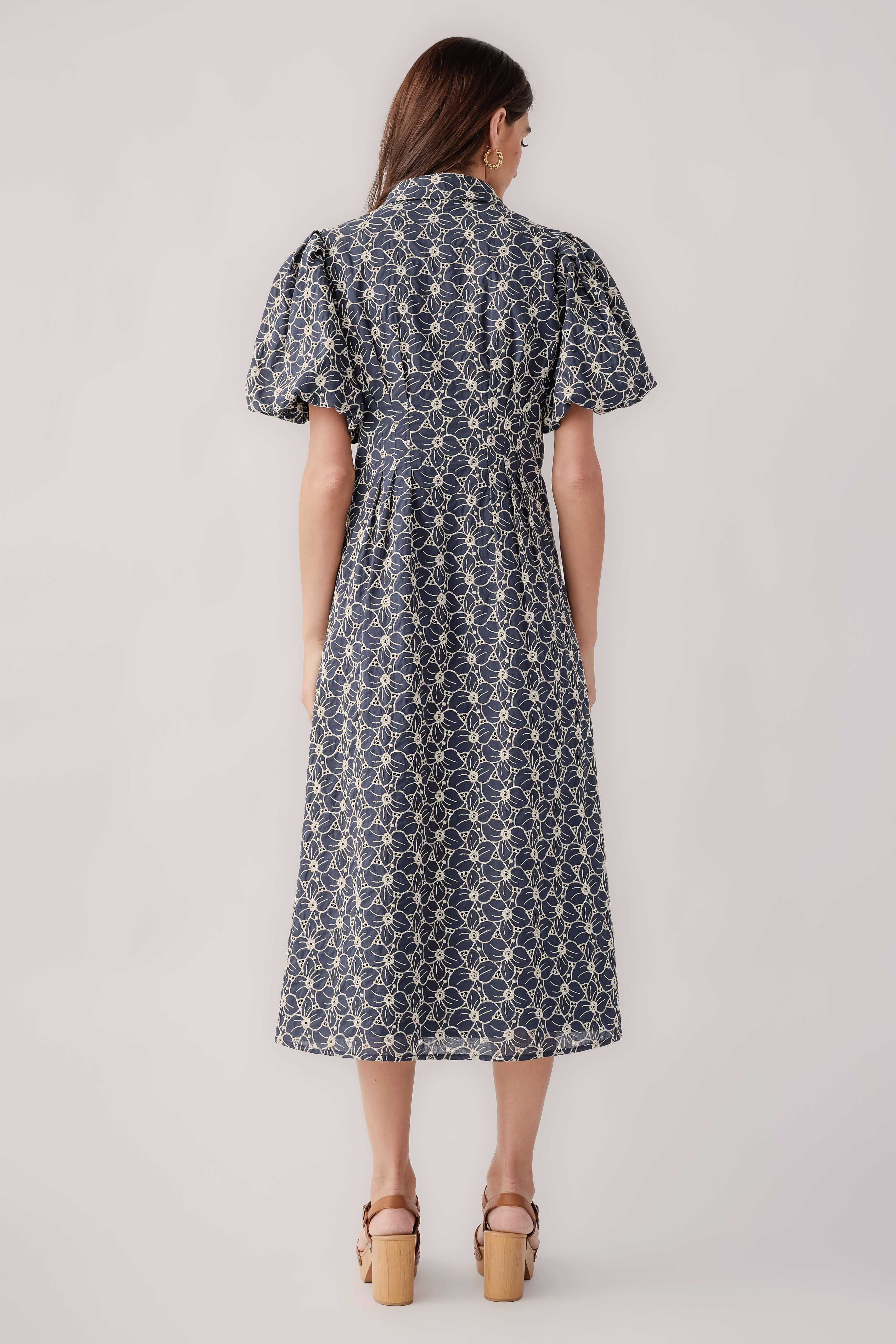 Navy floral eyelet midi dress, back view, short flutter sleeves