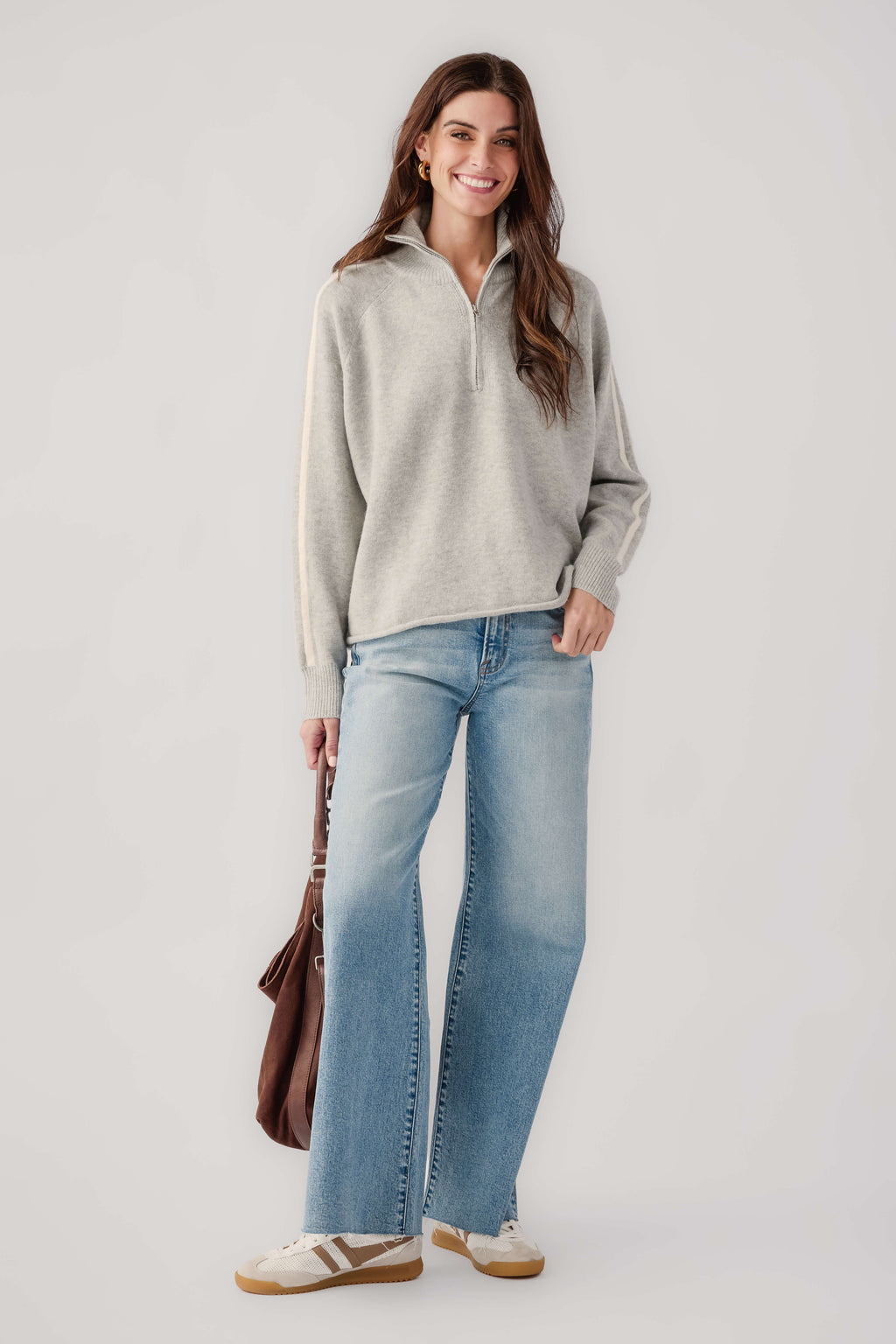 Heather grey 1/2-zip sweater with cream stripe detail and relaxed fit