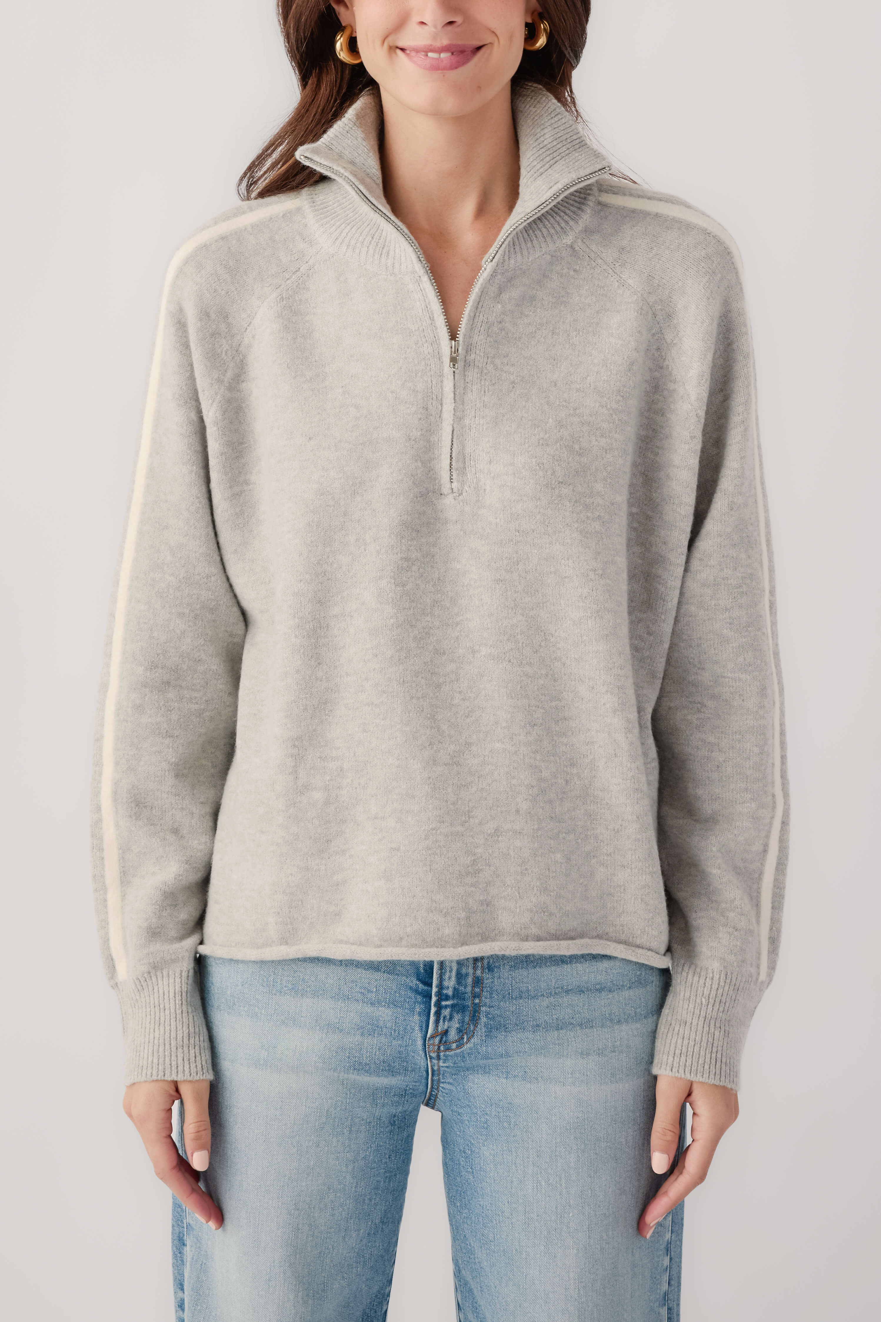 Heather grey 1/2-zip sweater with cream stripe trim on collar and sleeves