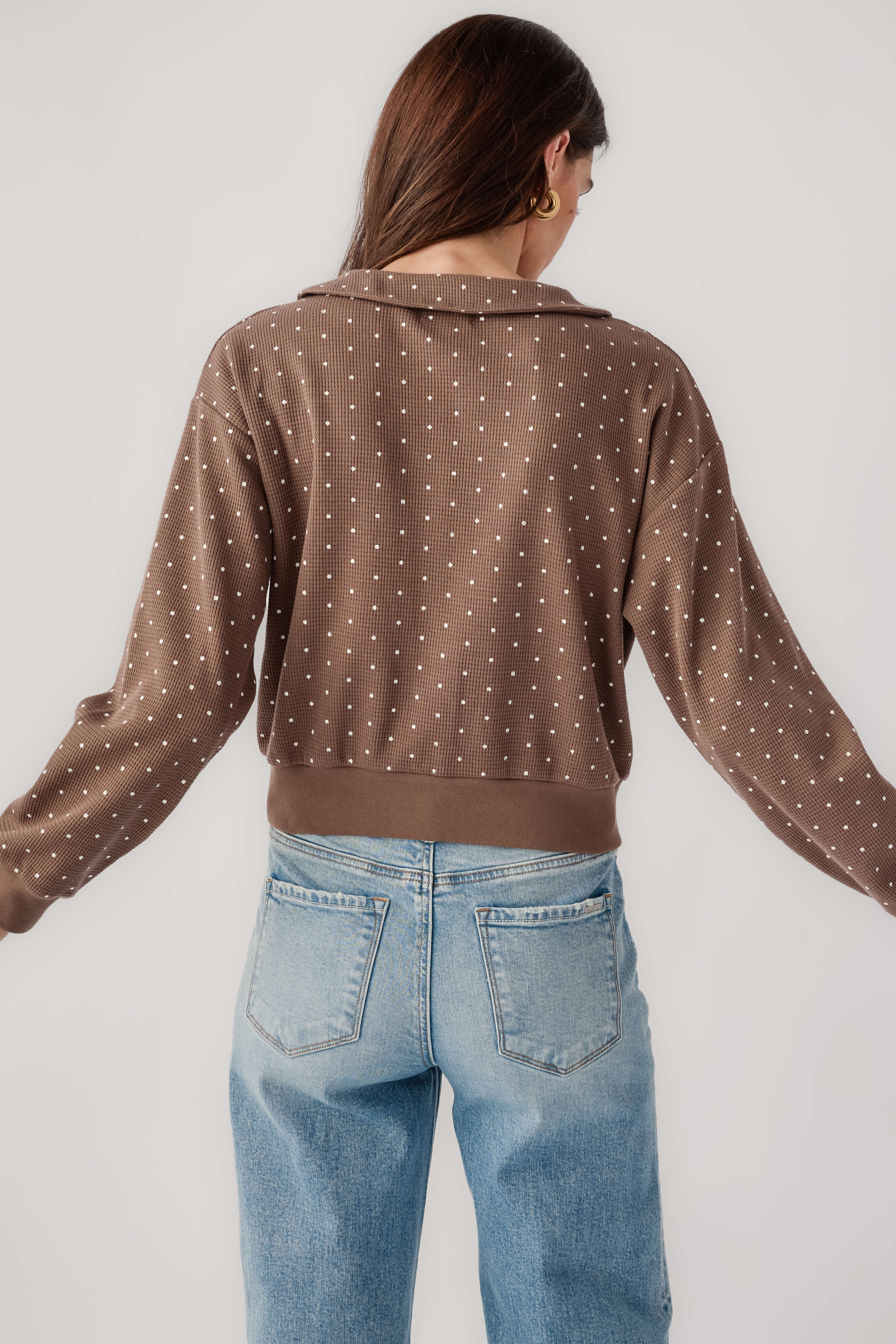 Mocha polka dot cardigan back view with Peter Pan collar and long sleeves
