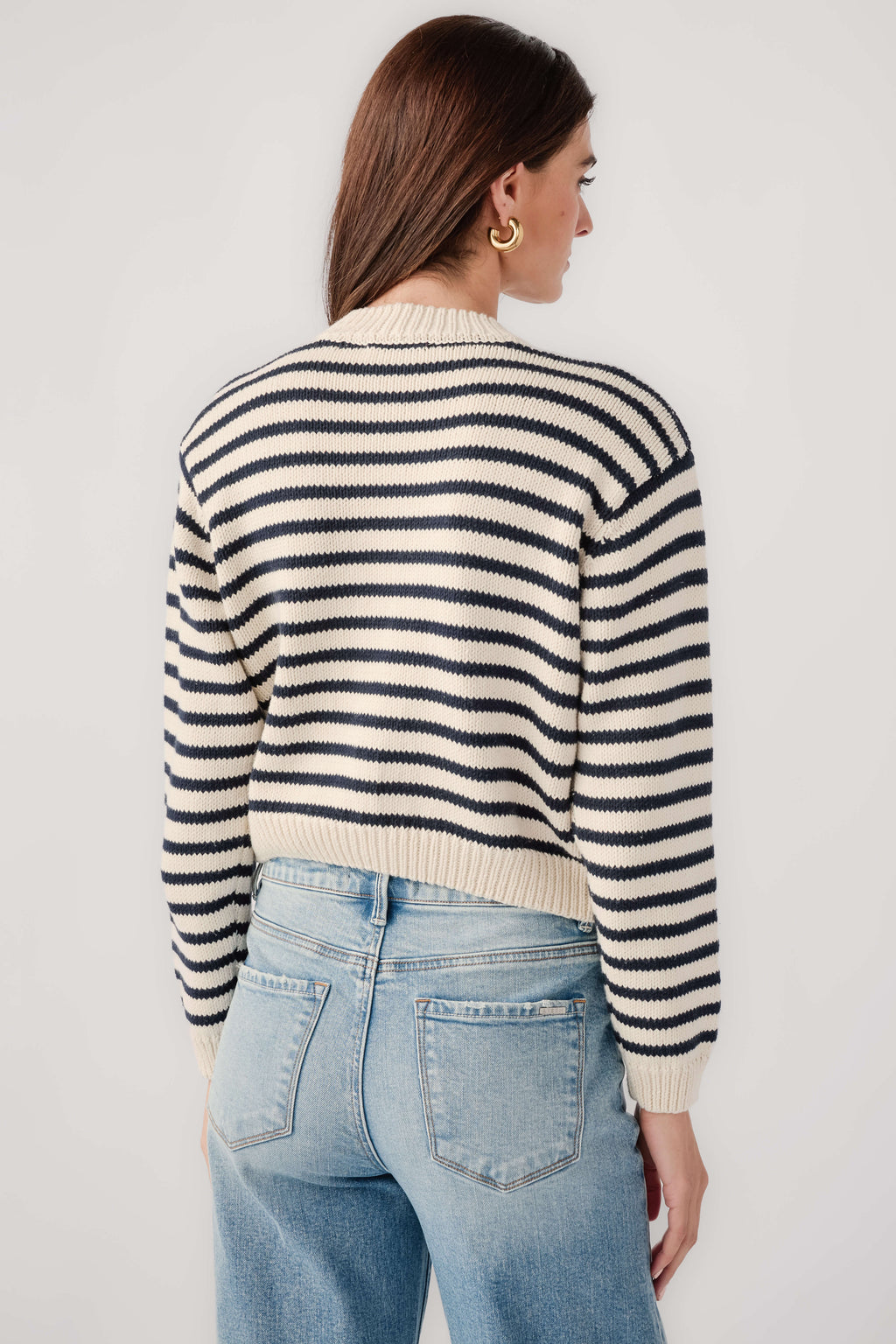 Striped button-front cardigan back view, black-and-white knit with ribbed cuffs