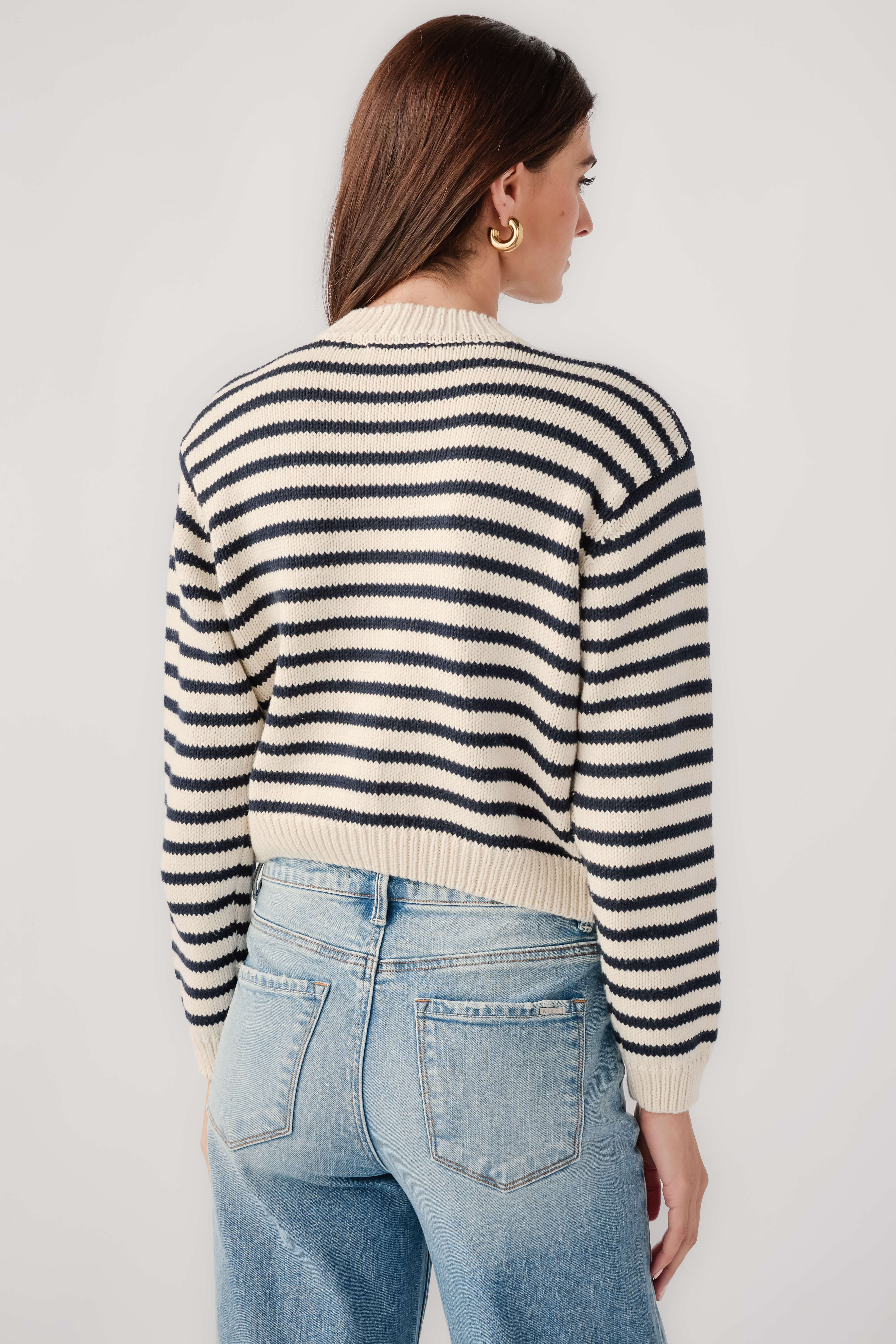 Striped button-front cardigan back view, black-and-white knit with ribbed cuffs