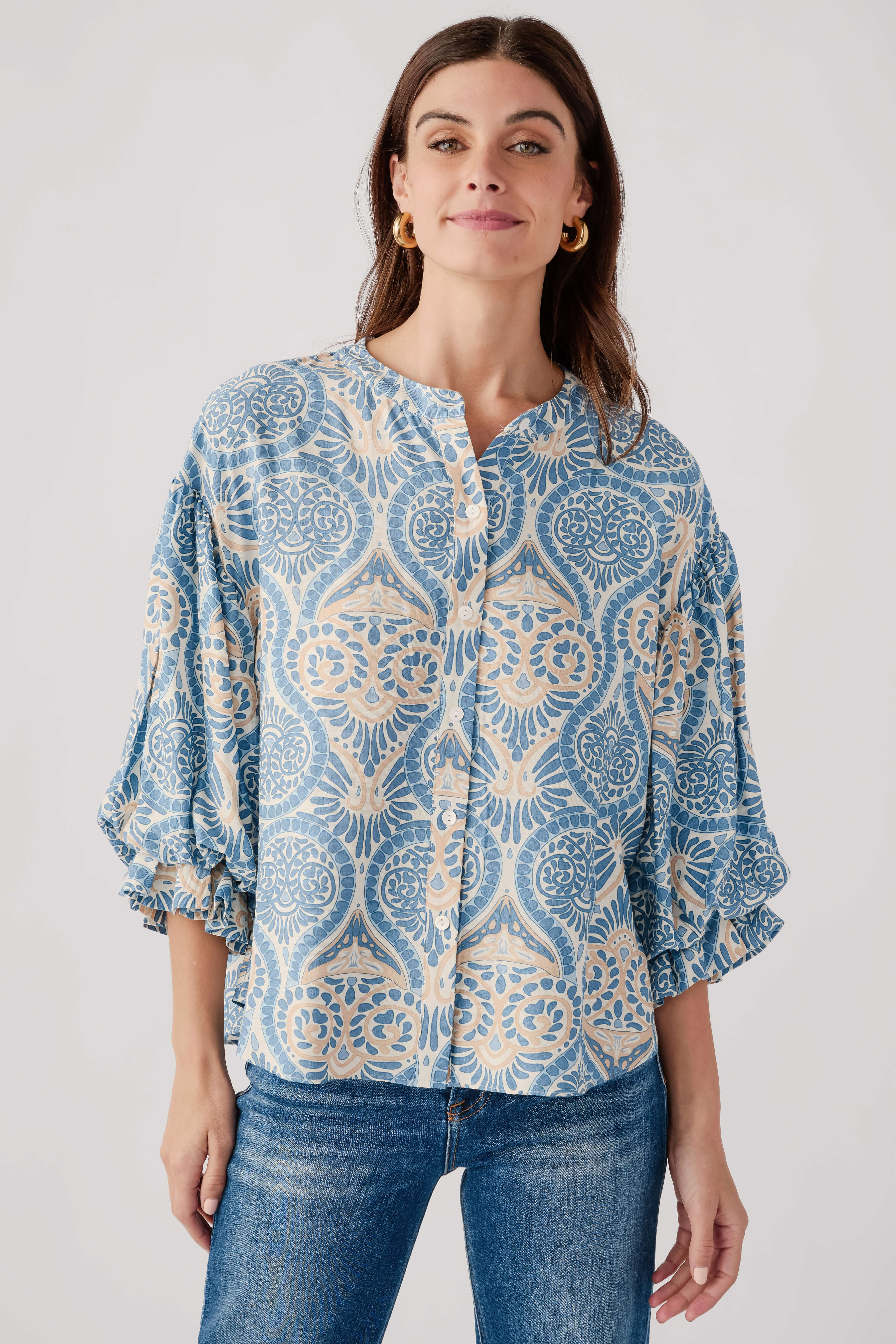 Blue damask print balloon-sleeve button-up top with round neckline, front view