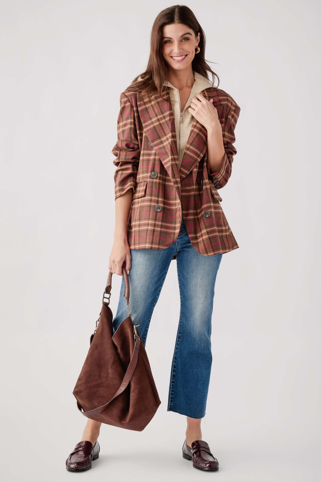 Brown and red plaid double-breasted blazer with notched lapels and long sleeves