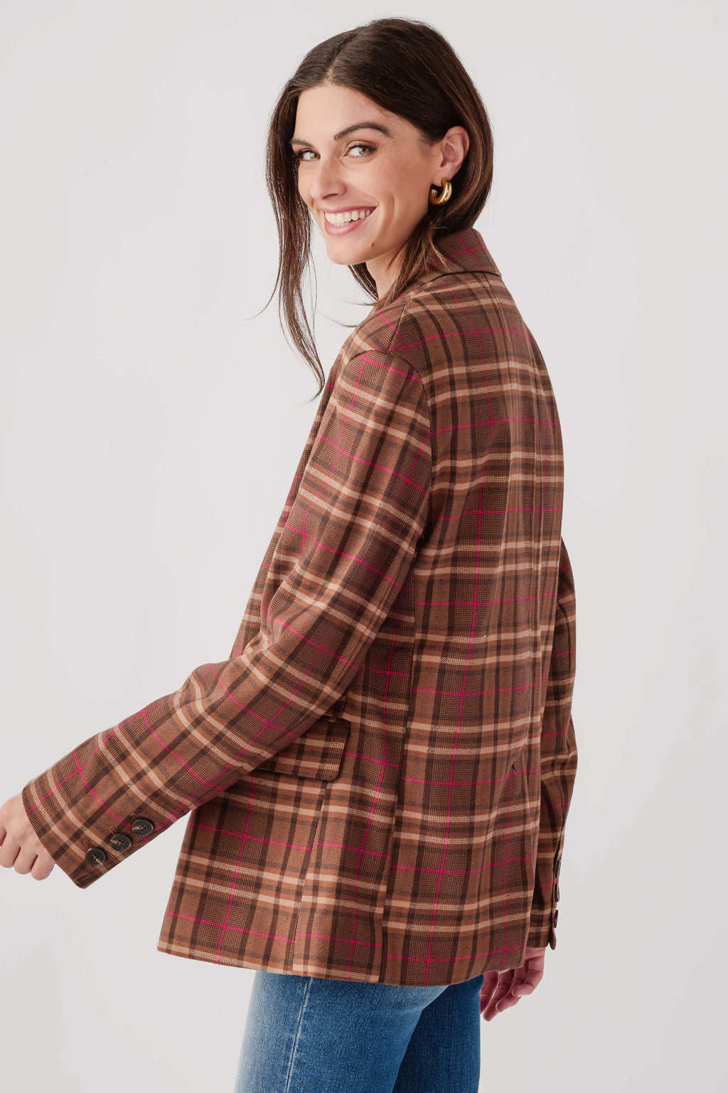 Brown plaid double-breasted blazer with two rows of buttons and long sleeves