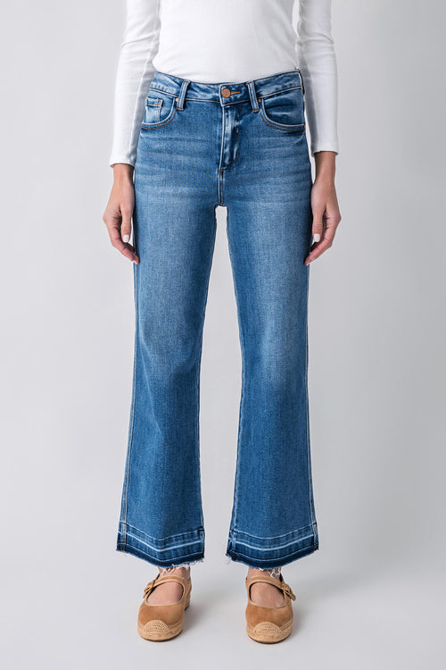 Medium blue high-rise straight jeans, back view, released hem detailing at ankle