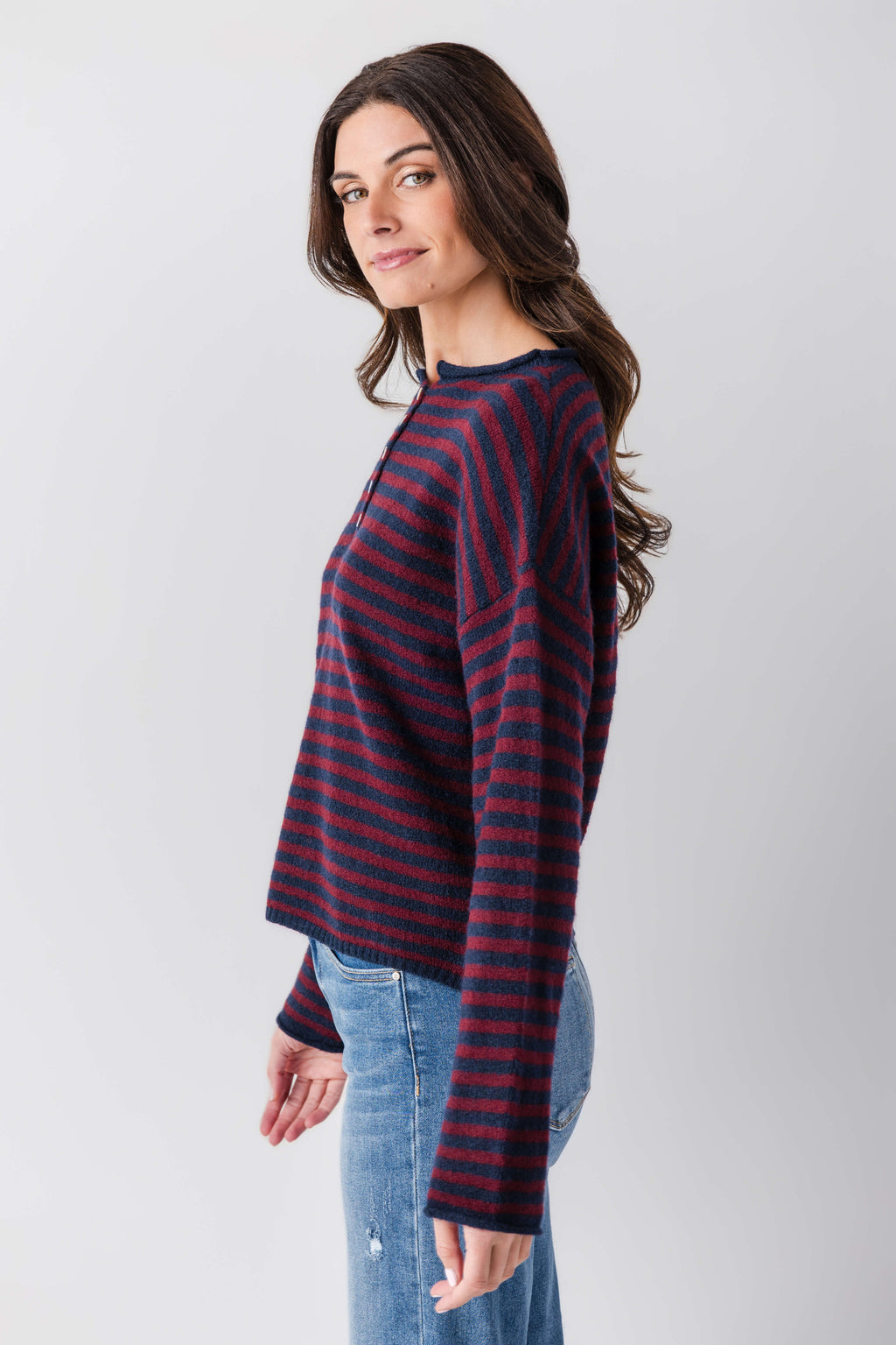 Striped henley pullover, navy and burgundy stripes, side view with long sleeves