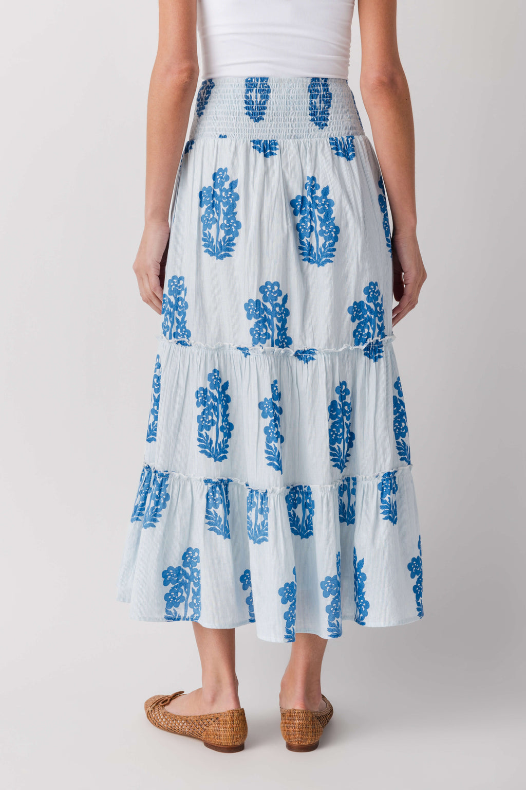 Light blue block print tiered maxi skirt, front view with smocked waist