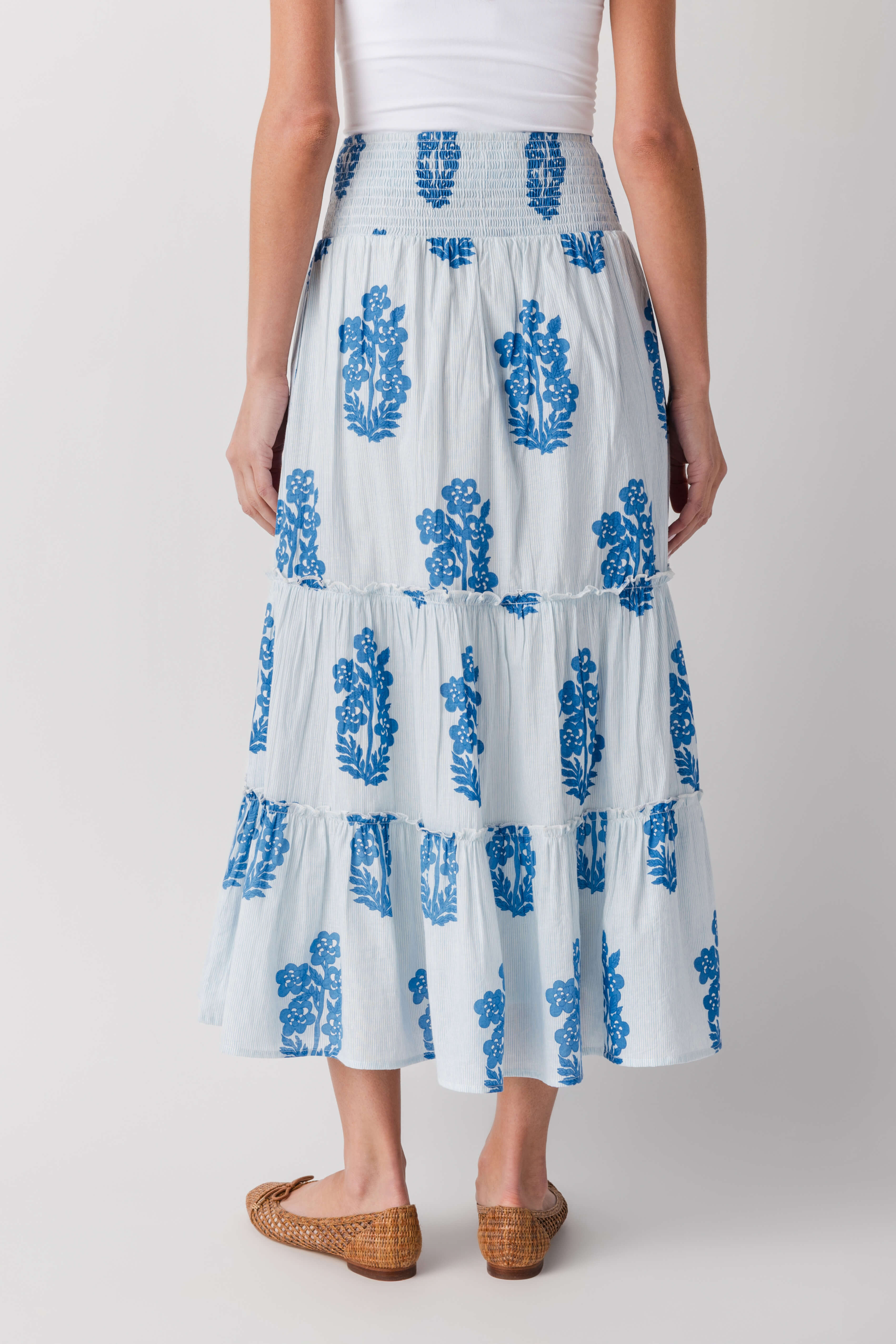Light blue block print tiered maxi skirt, front view with smocked waist