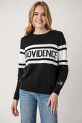 Black crewneck sweater with wide white stripes and Providence lettering on the front