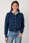 Navy ruffle-collar cardigan with button-front, knit texture, gold buttons