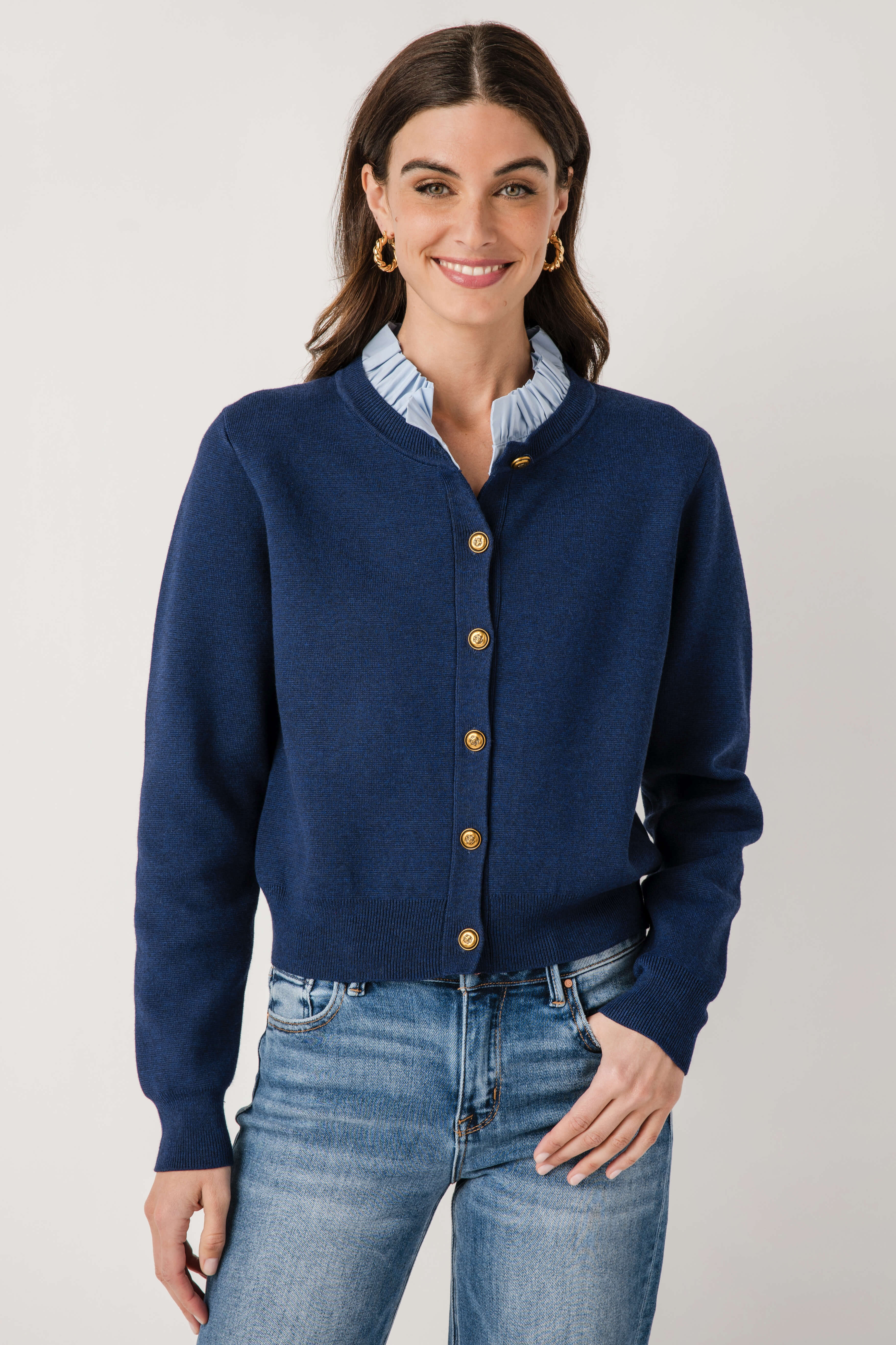 Navy ruffle-collar cardigan with button-front, knit texture, gold buttons