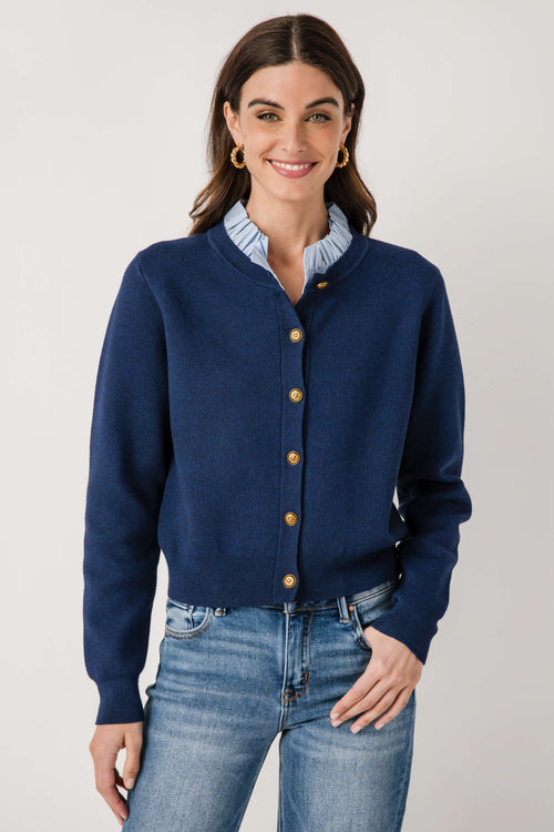 Navy ruffle-collar cardigan with button-front, knit texture, gold buttons