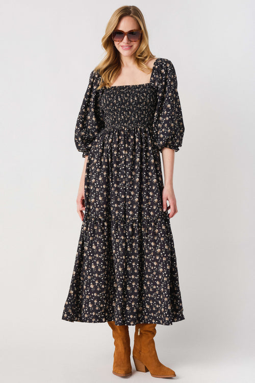 Black floral midi dress with square neckline, 3/4 puff sleeves and full skirt