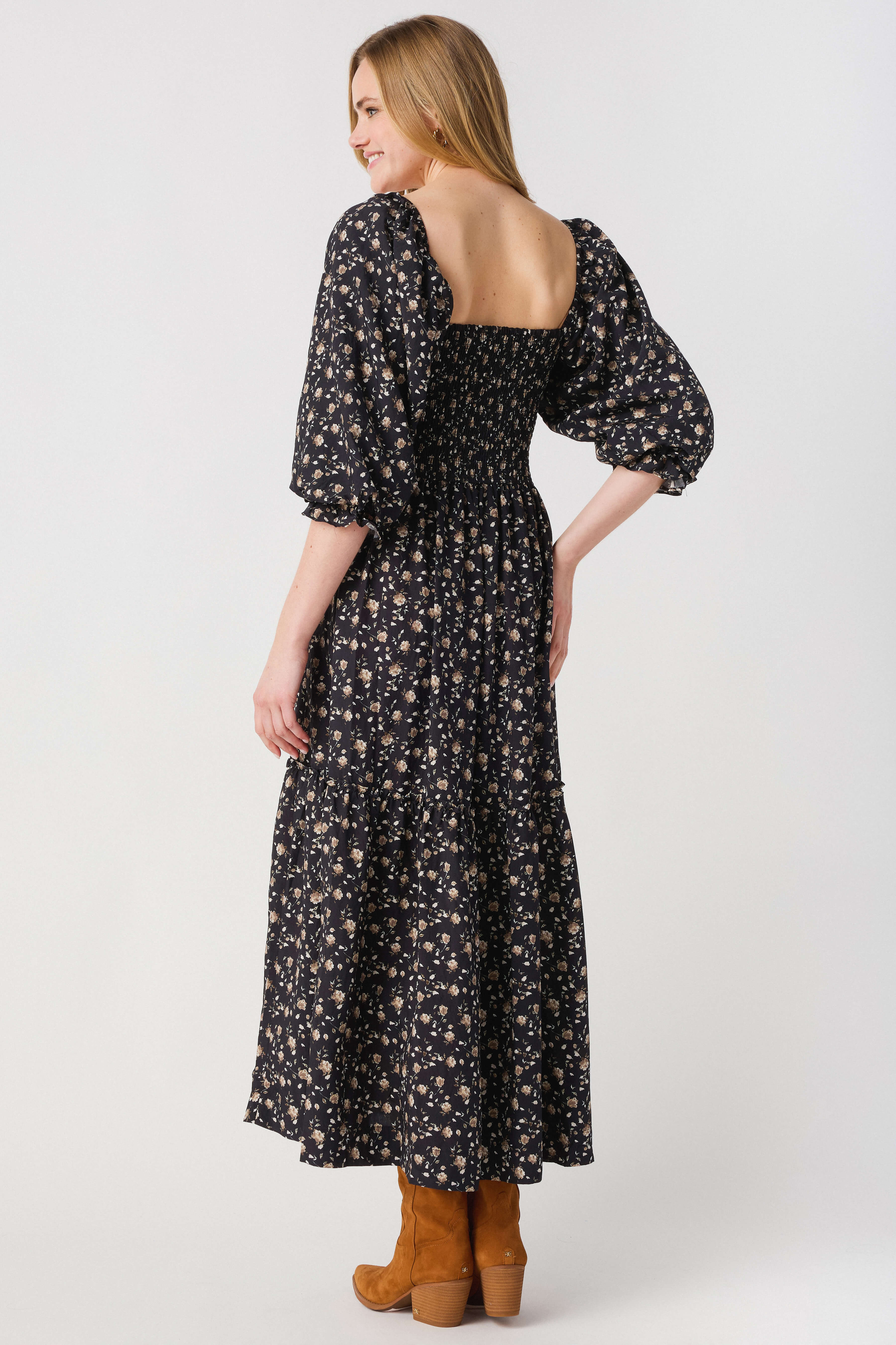 Black floral midi dress back view with square back and 3/4 puff sleeves