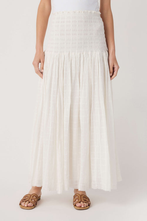 Ivory tiered maxi skirt with smocked waistband and airy pleated tiers