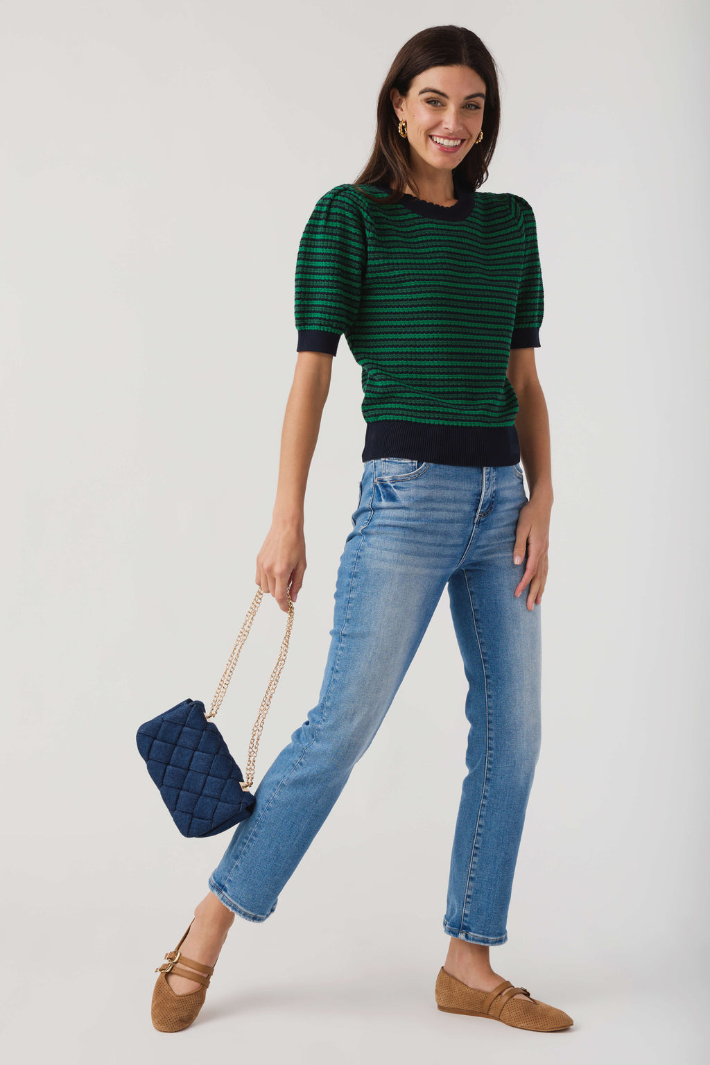 Front view of green and navy striped crochet top with crew neck and ribbed trim