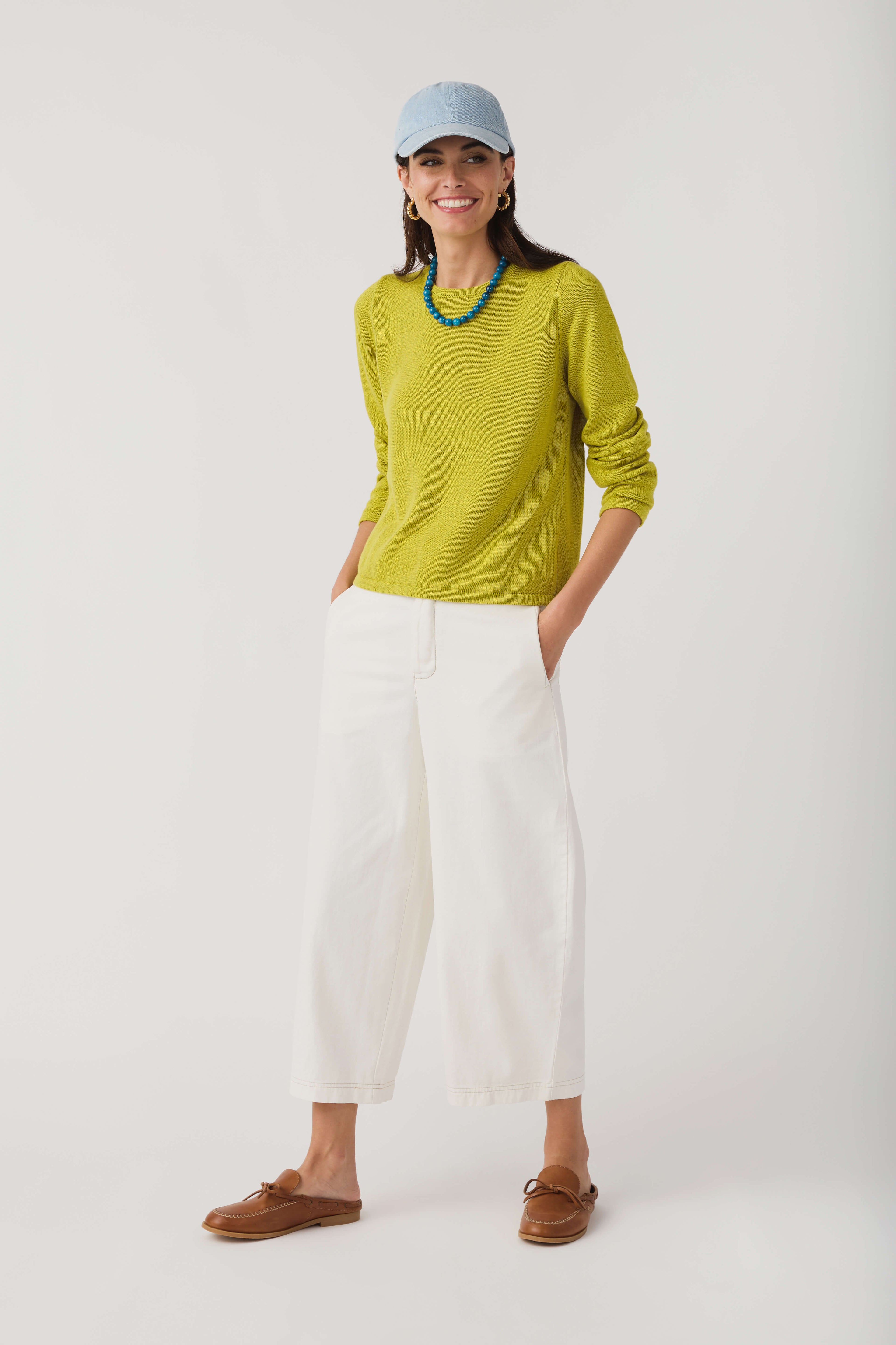 Lime knit crewneck sweater with long sleeves and ribbed cuffs