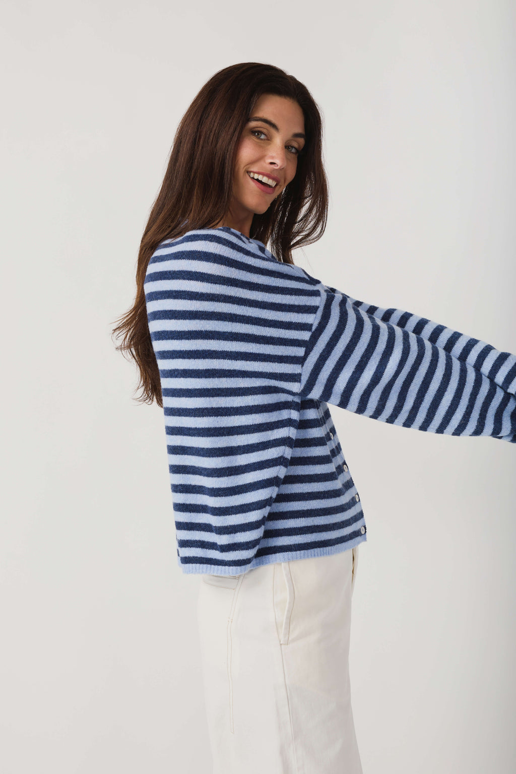 Striped knit cardigan with button front, long sleeves, crew neck; side view