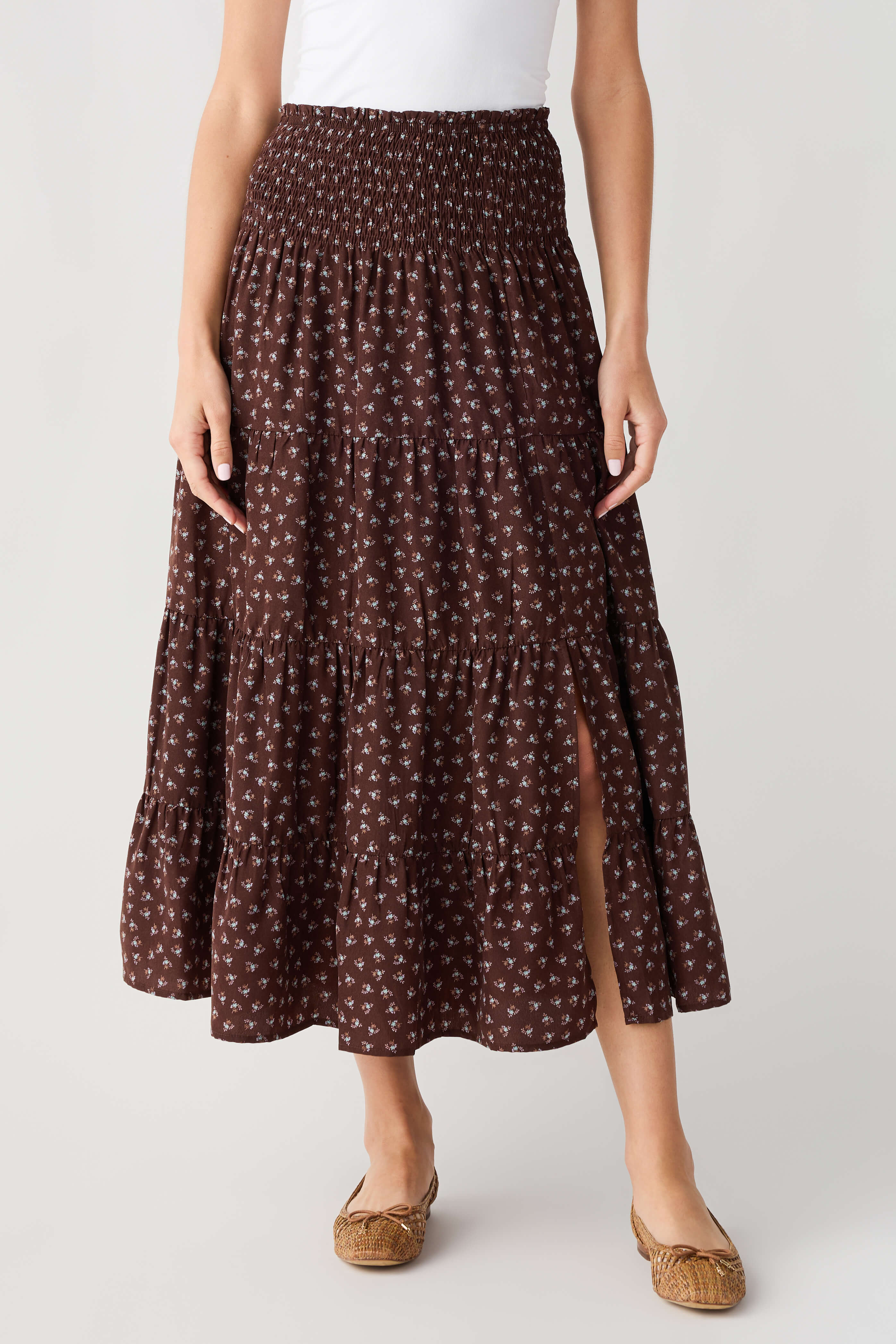Smocked-waist floral midi skirt in espresso brown, gathered tiered hem