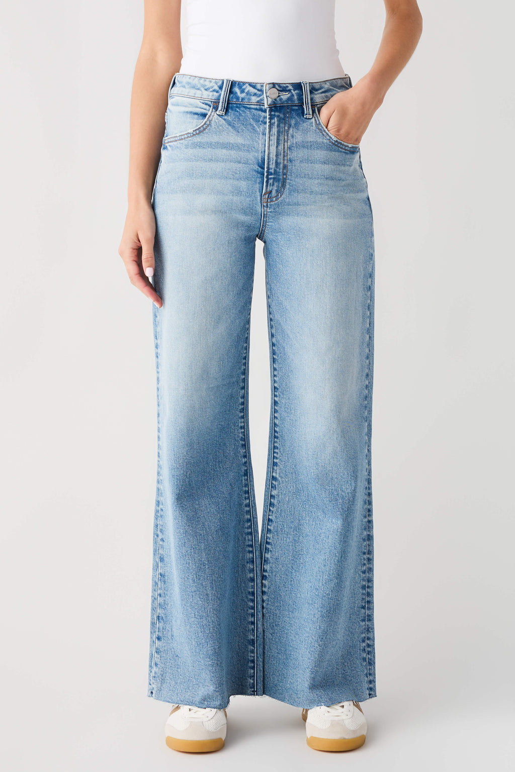 Light blue high-rise wide-leg jeans with button fly and front patch pockets