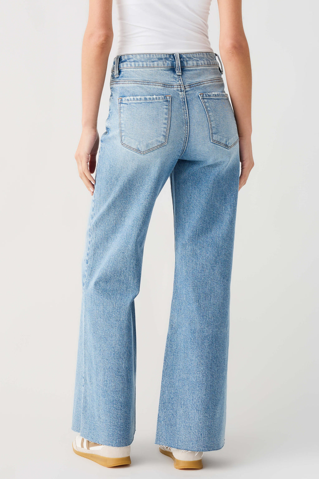 Light blue high-rise wide-leg jeans with two back patch pockets and belt loops
