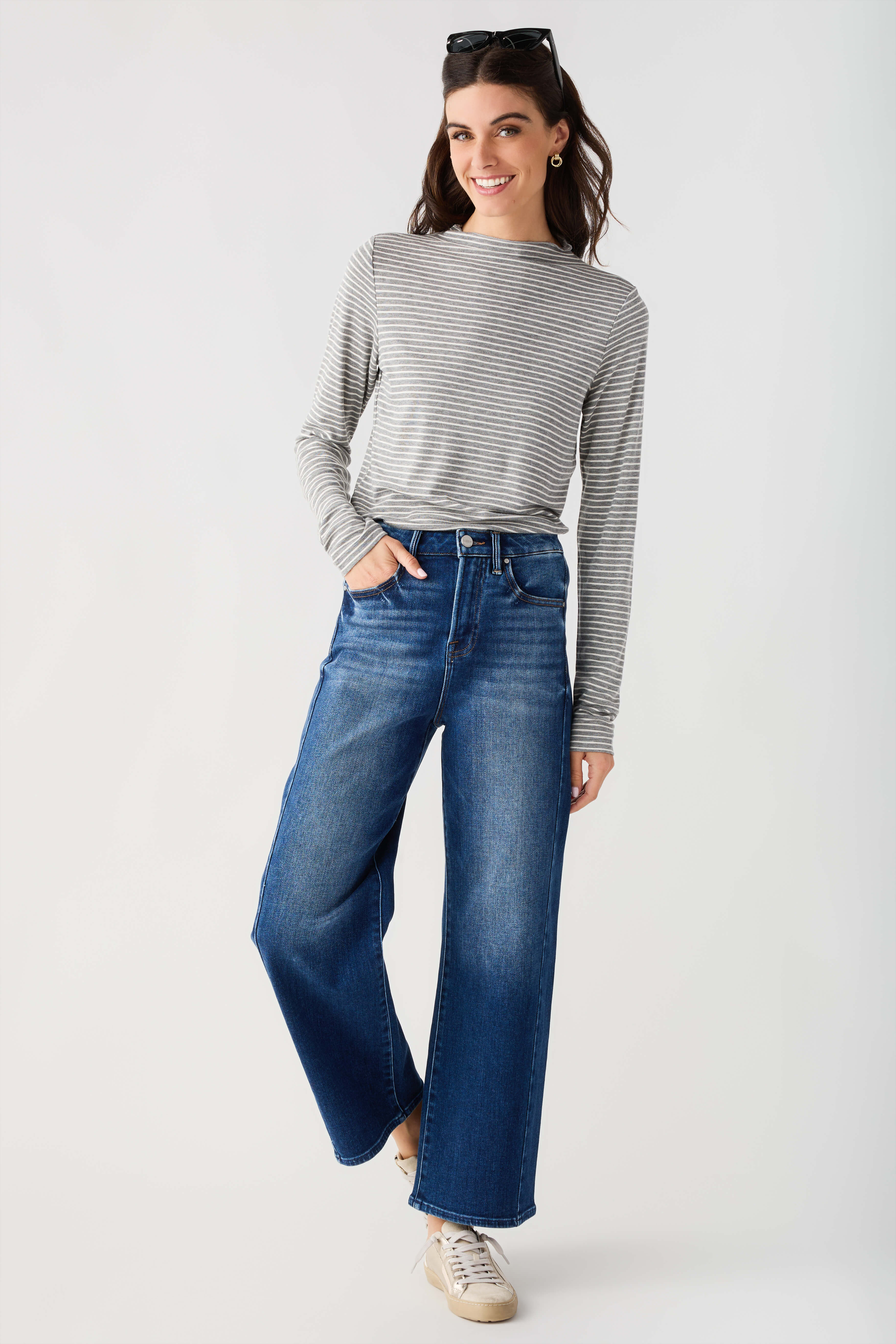Heather grey-and-white striped mockneck knit top with long sleeves, front view