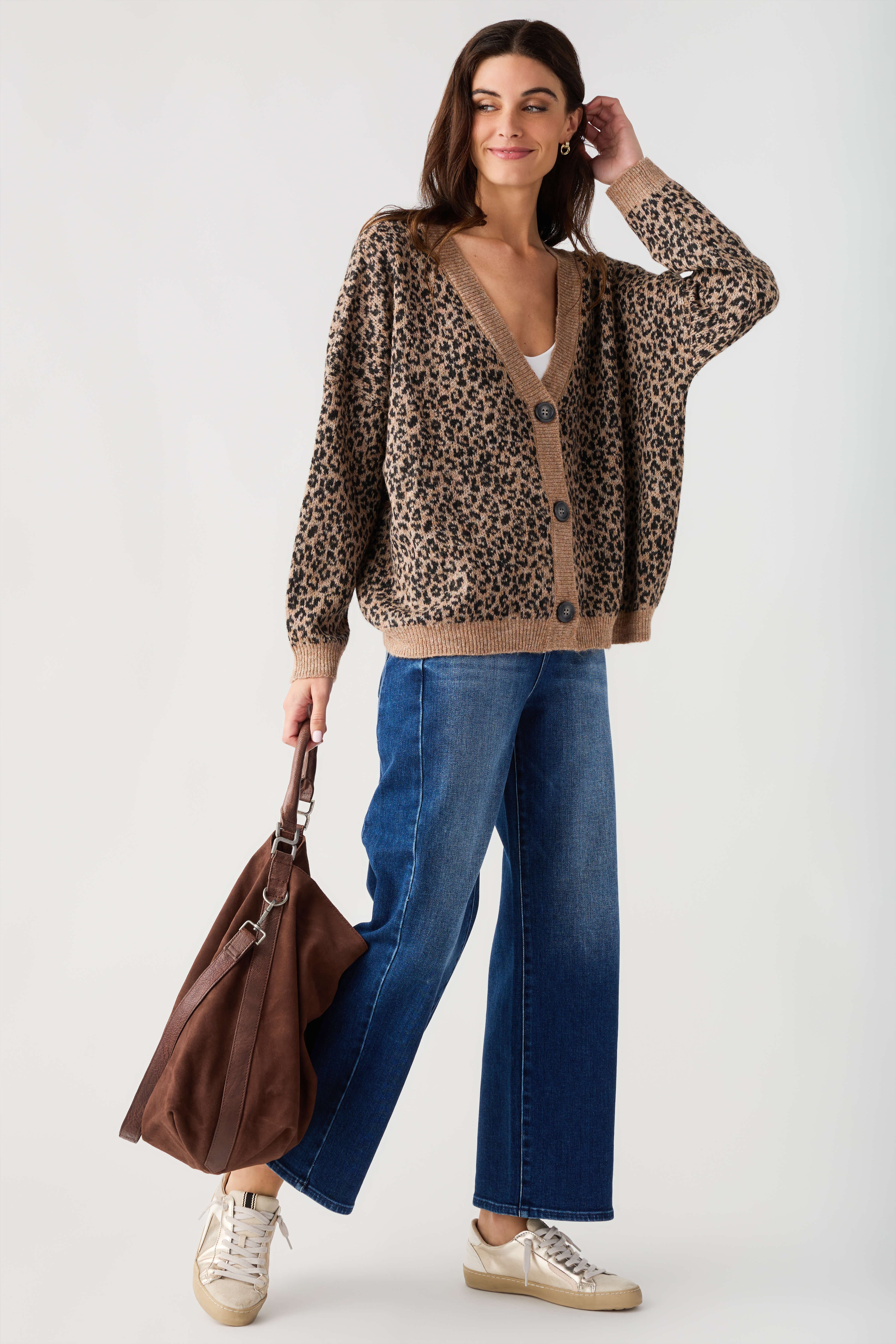 Leopard print V-neck cardigan sweater with button front and ribbed cuffs