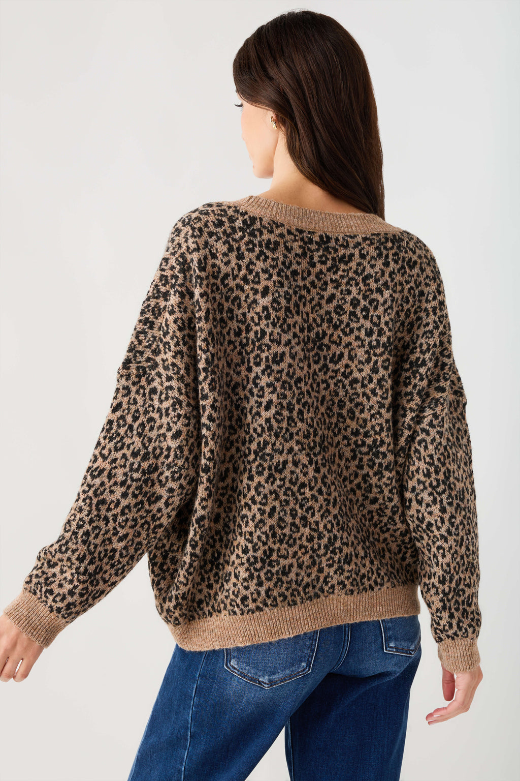 Leopard print cardigan sweater, full back view with ribbed hem and cuffs