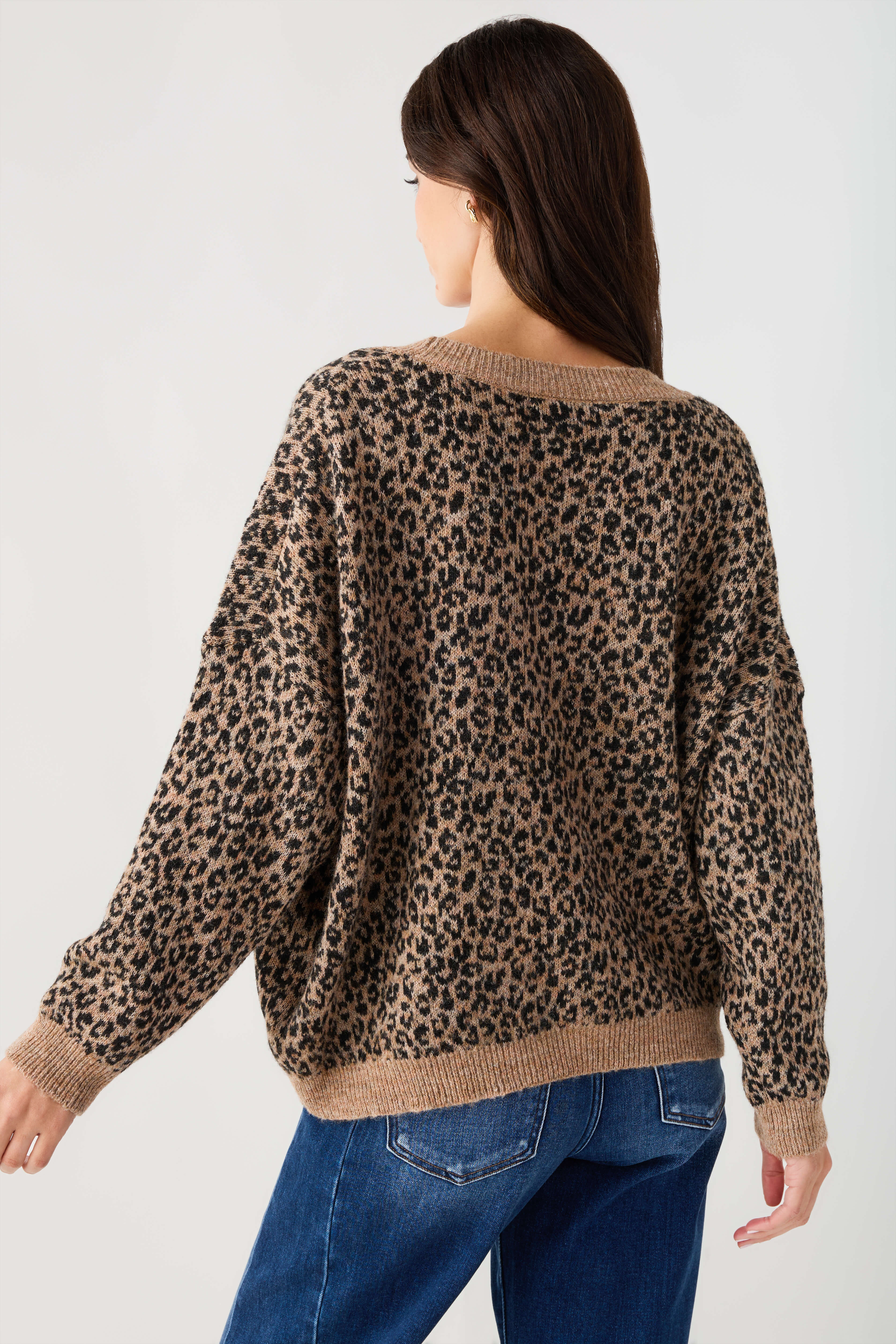 Leopard print cardigan sweater, full back view with ribbed hem and cuffs