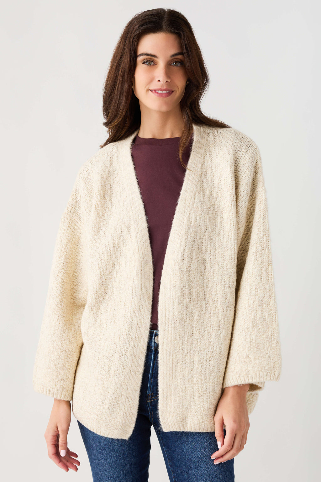 Light beige open-front cardigan in textured knit with long sleeves, front view