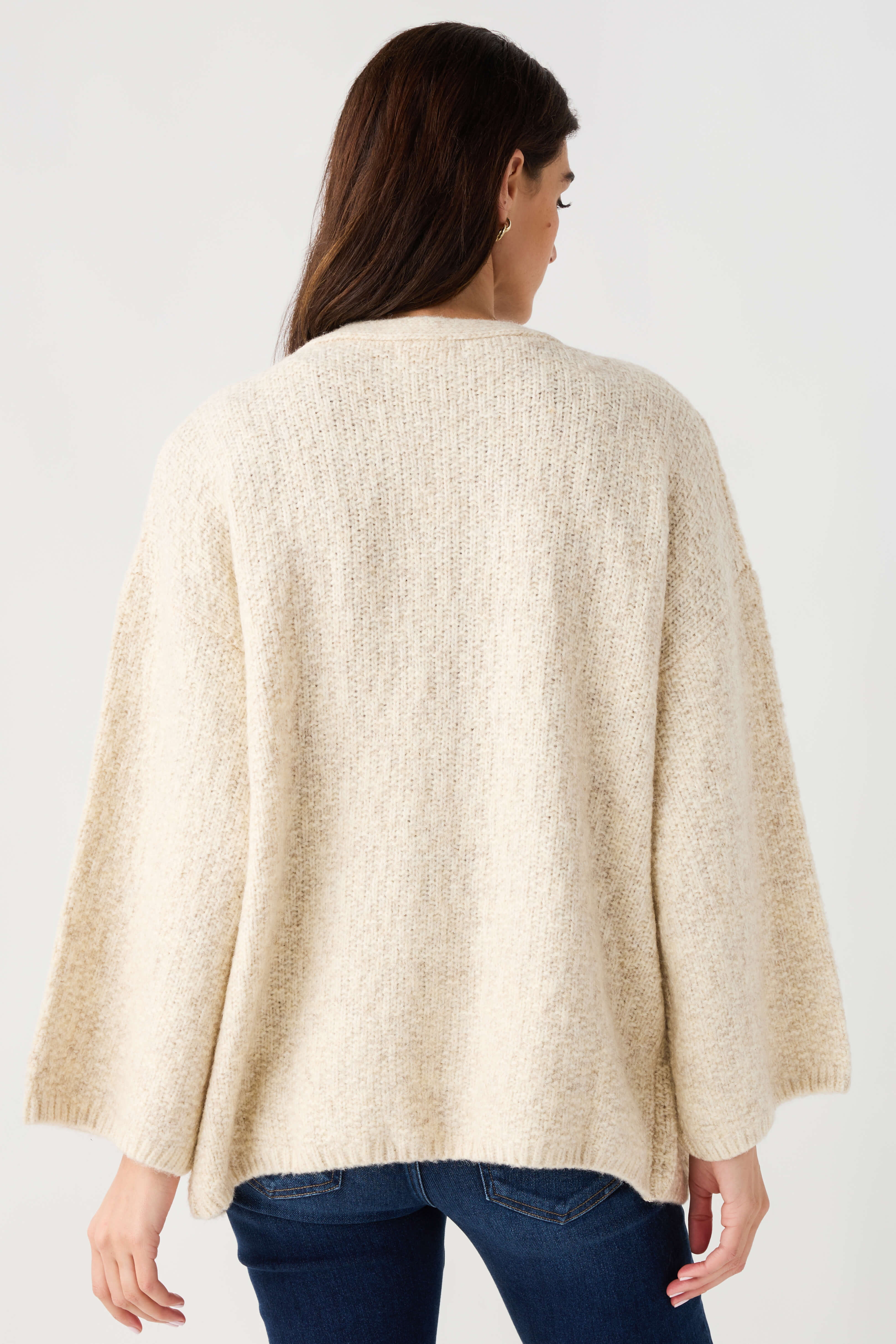 Light beige textured knit open-front cardigan with long sleeves, back view