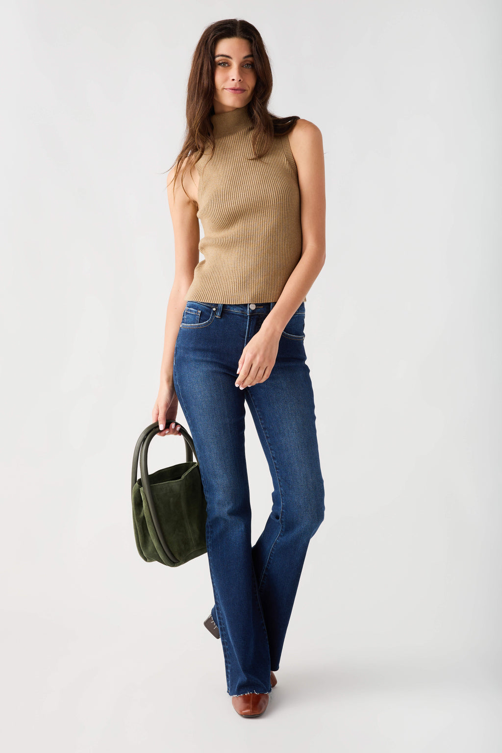 Sleeveless ribbed mock-neck top in tan-brown, close fit with ribbed texture.