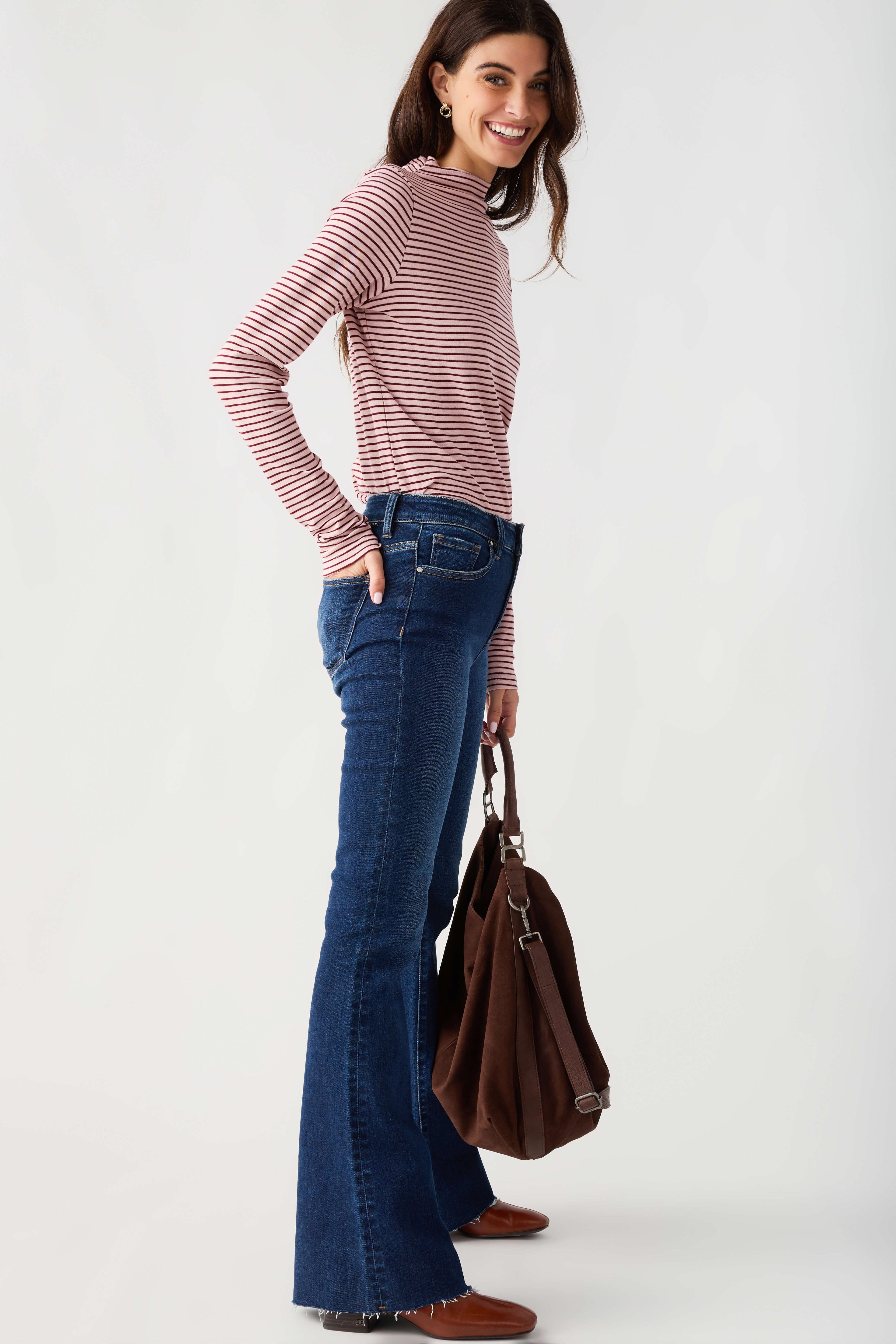 Mauve-and-white striped mockneck knit top with long sleeves, front view