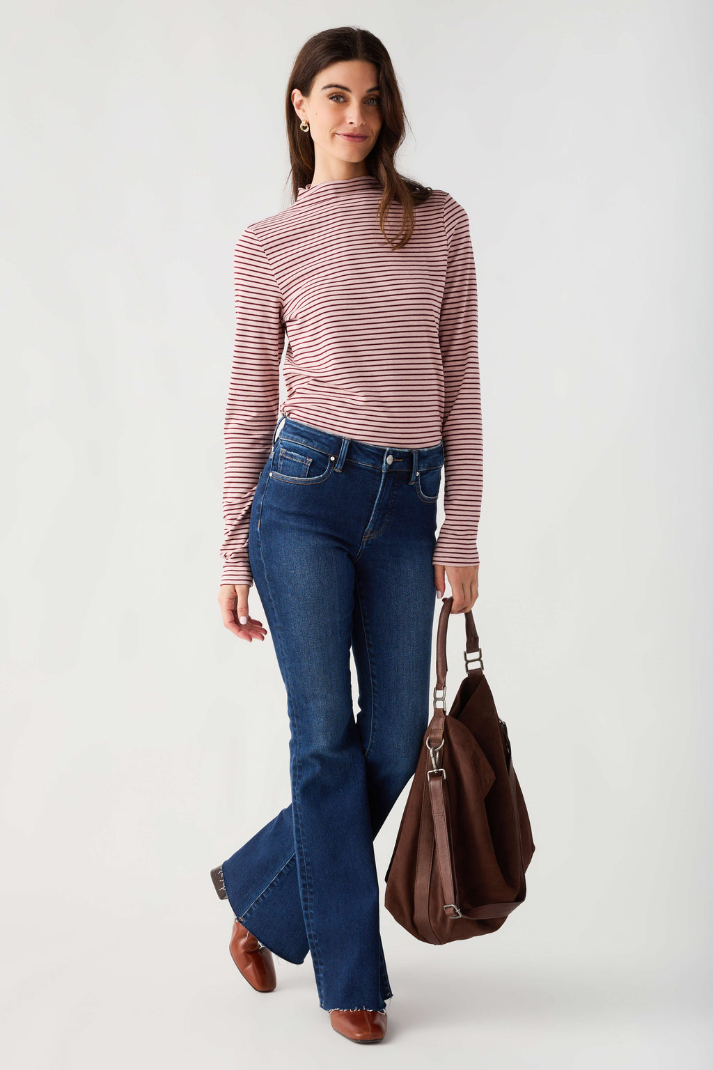 Mauve-and-white striped mockneck knit top with long sleeves, front view