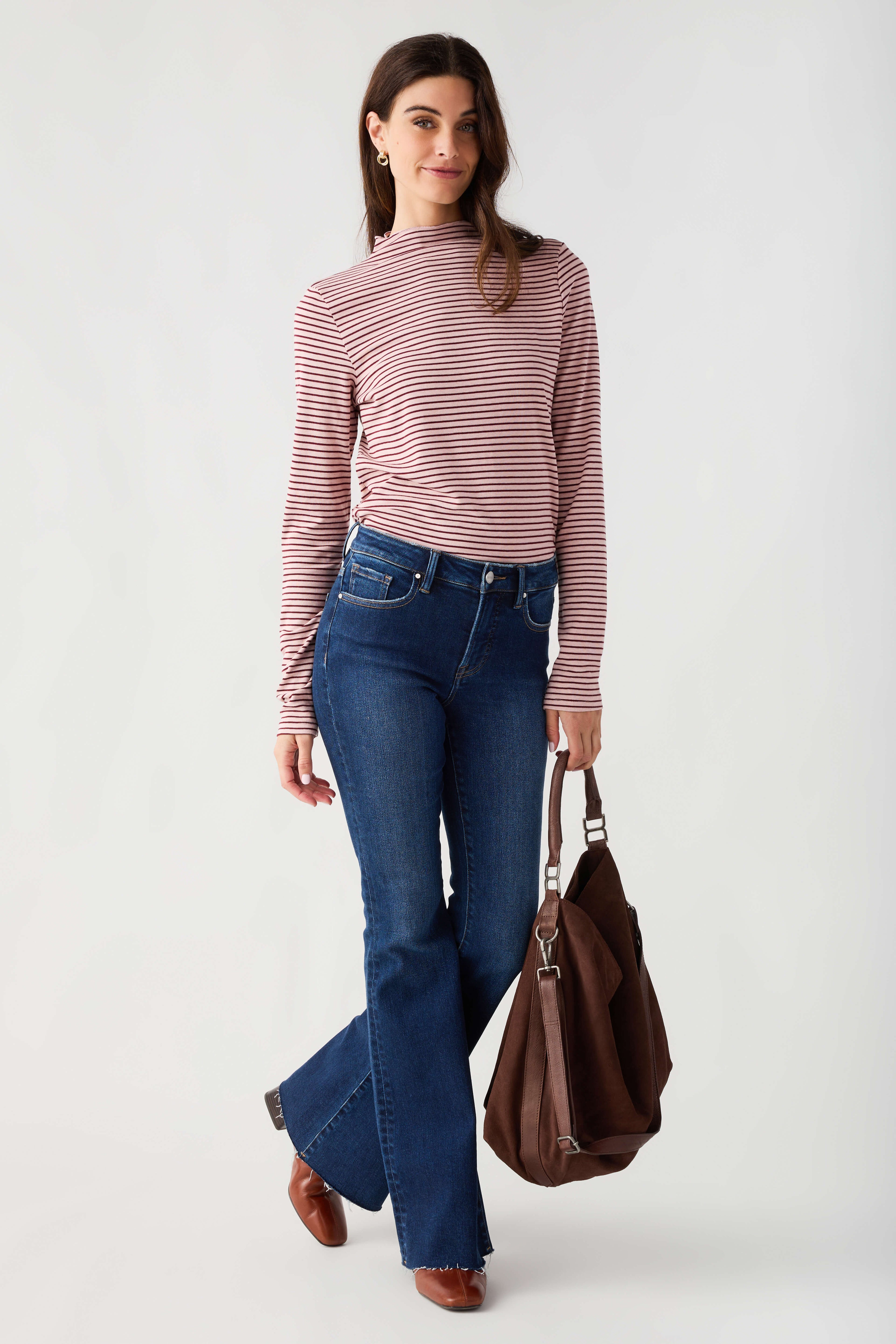 Mauve-and-white striped mockneck knit top with long sleeves, front view