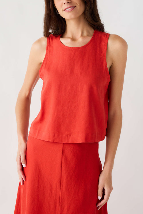 Red linen sleeveless top with round neck and layered peplum hem