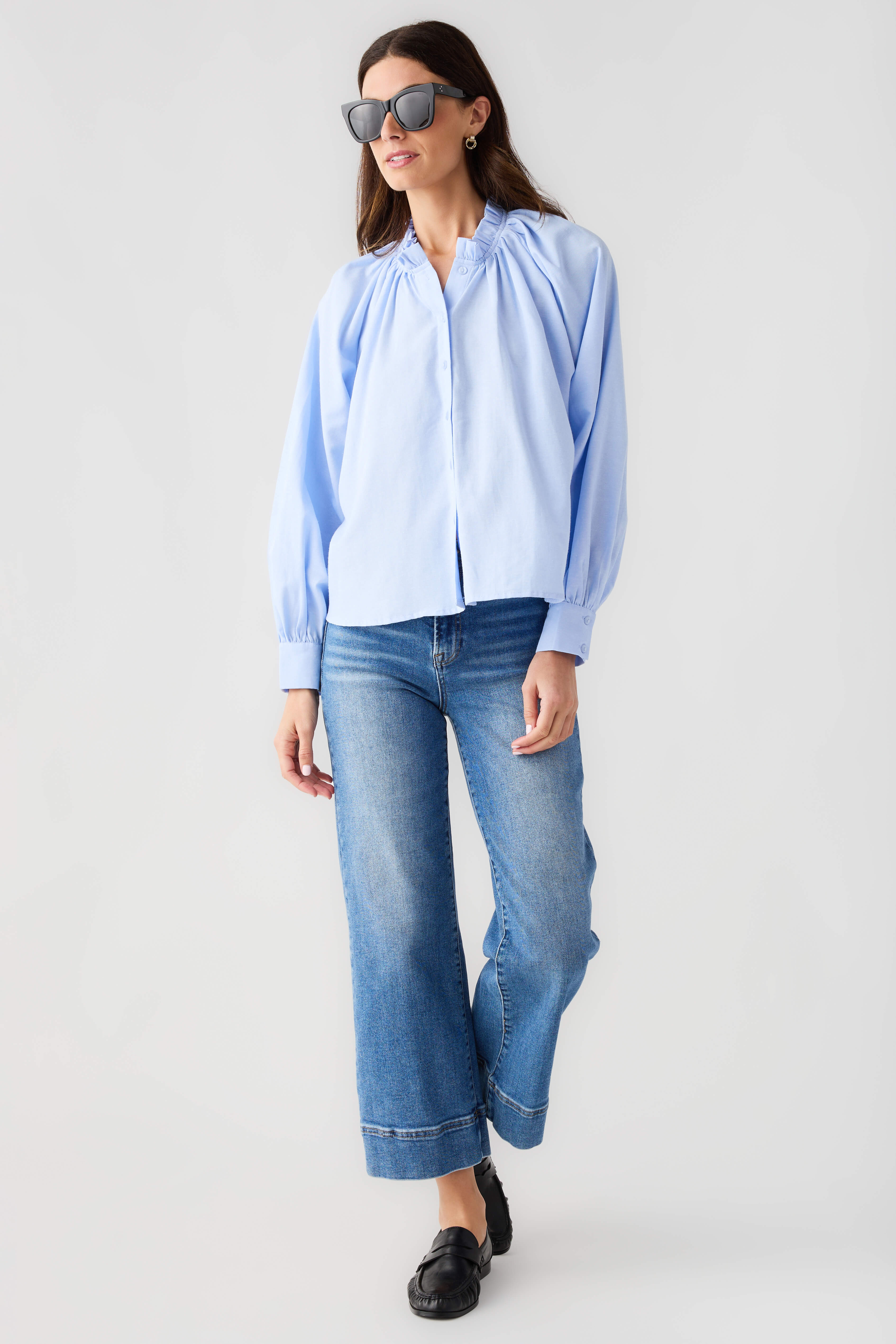 Light blue ruffle button-down top with gathered neckline and long balloon sleeves