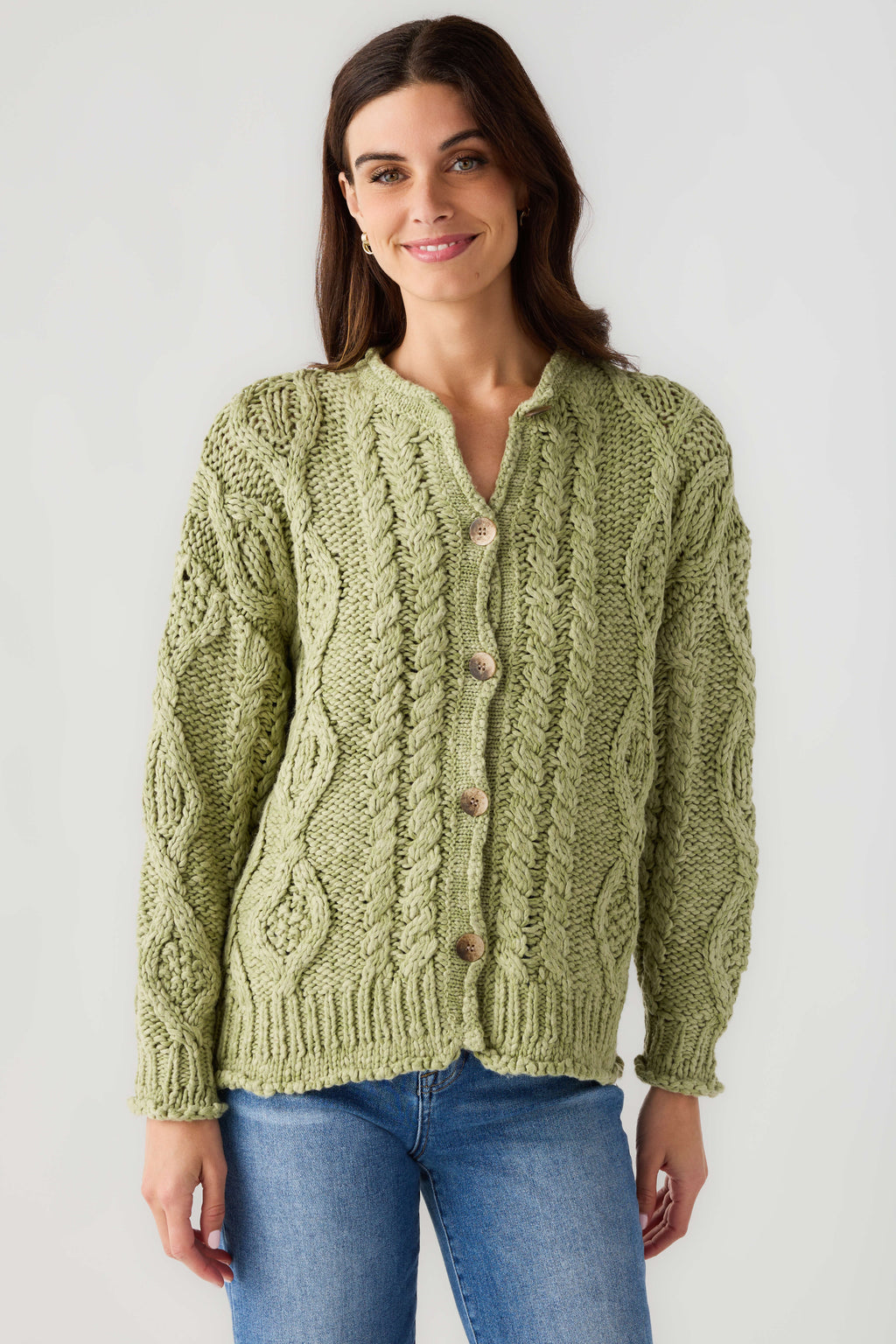 Light green cable-knit cardigan with button front and long sleeves