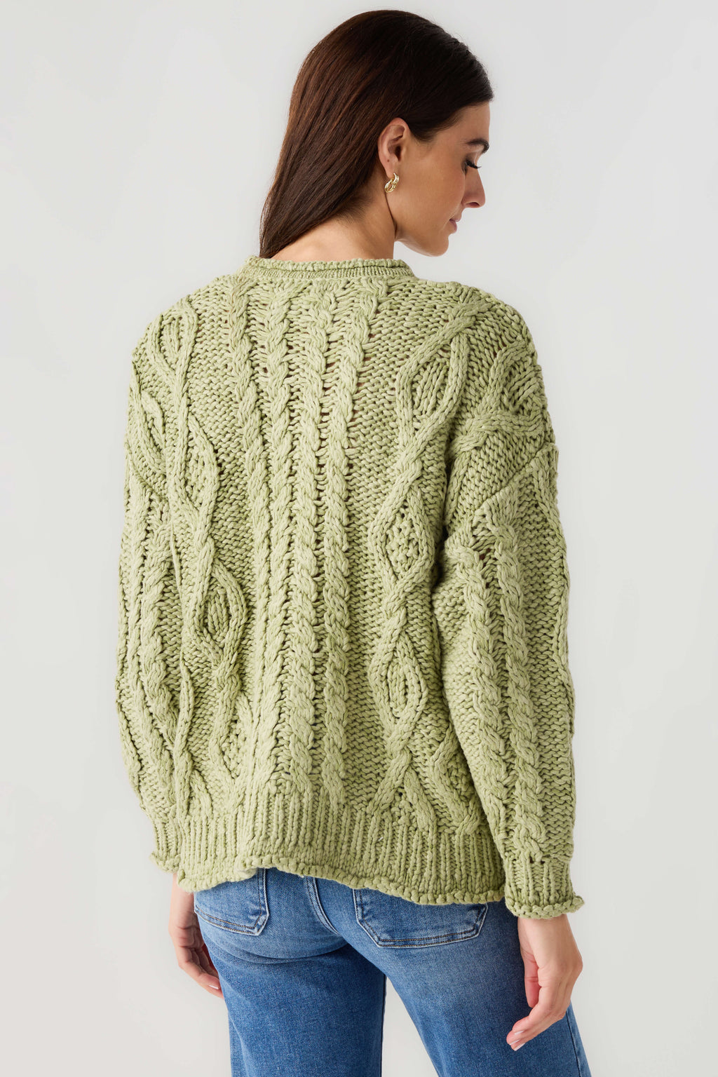 Light green cable-knit cardigan with long sleeves, textured back design