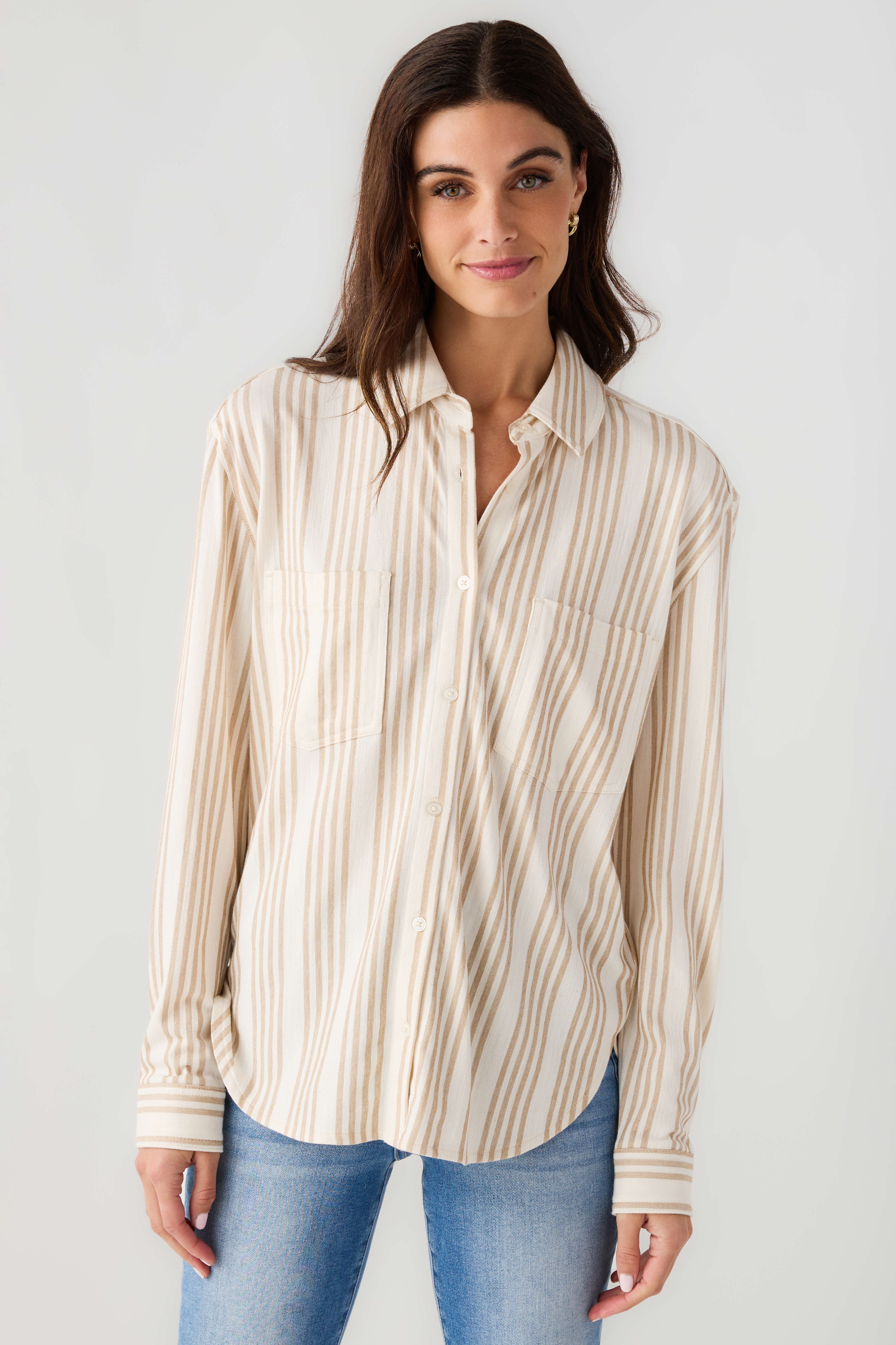 Cream and tan striped button-up shirt with long sleeves and front buttons