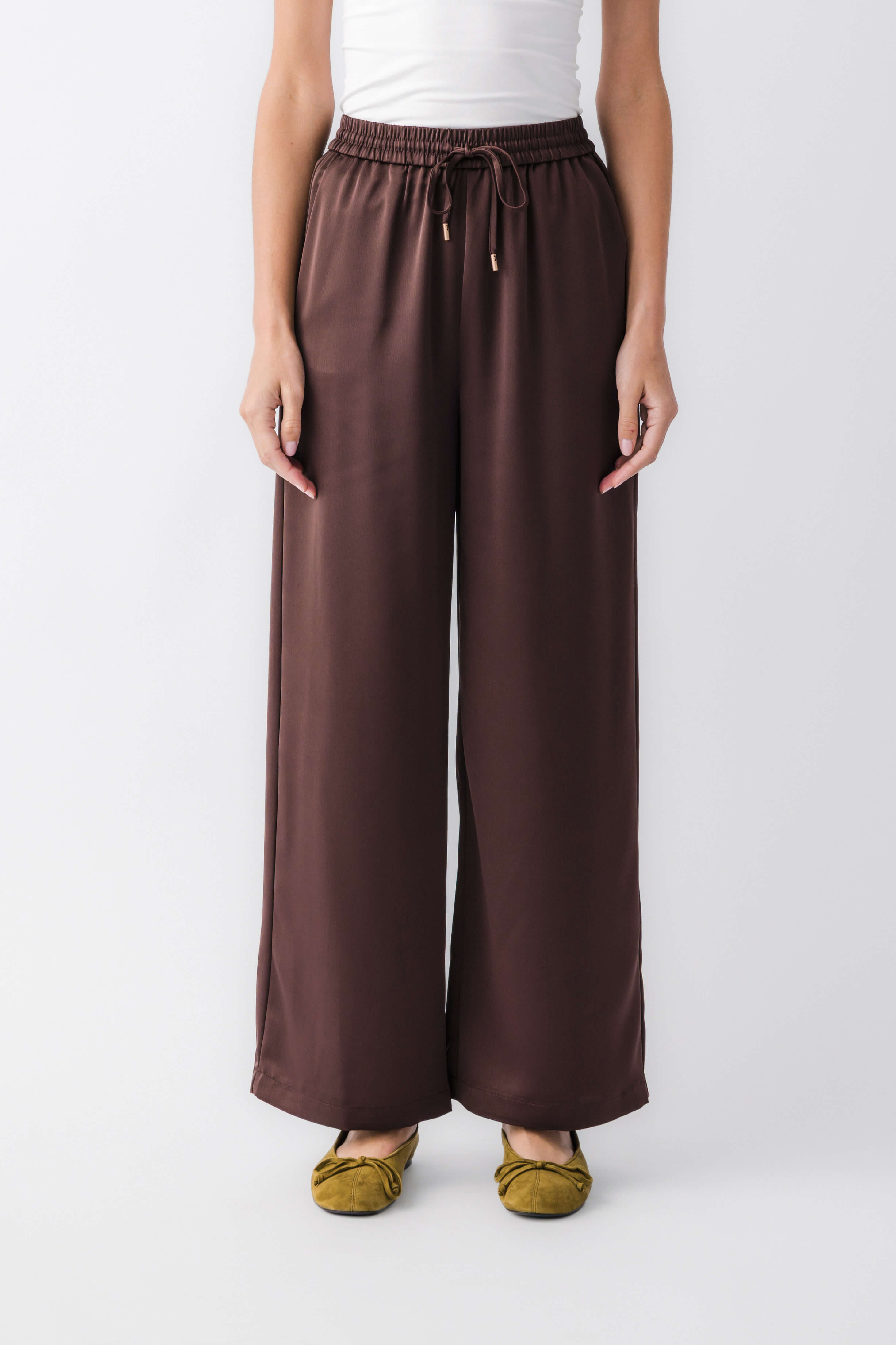 Espresso satin wide-leg pants, front view with elastic waist and small drawstring