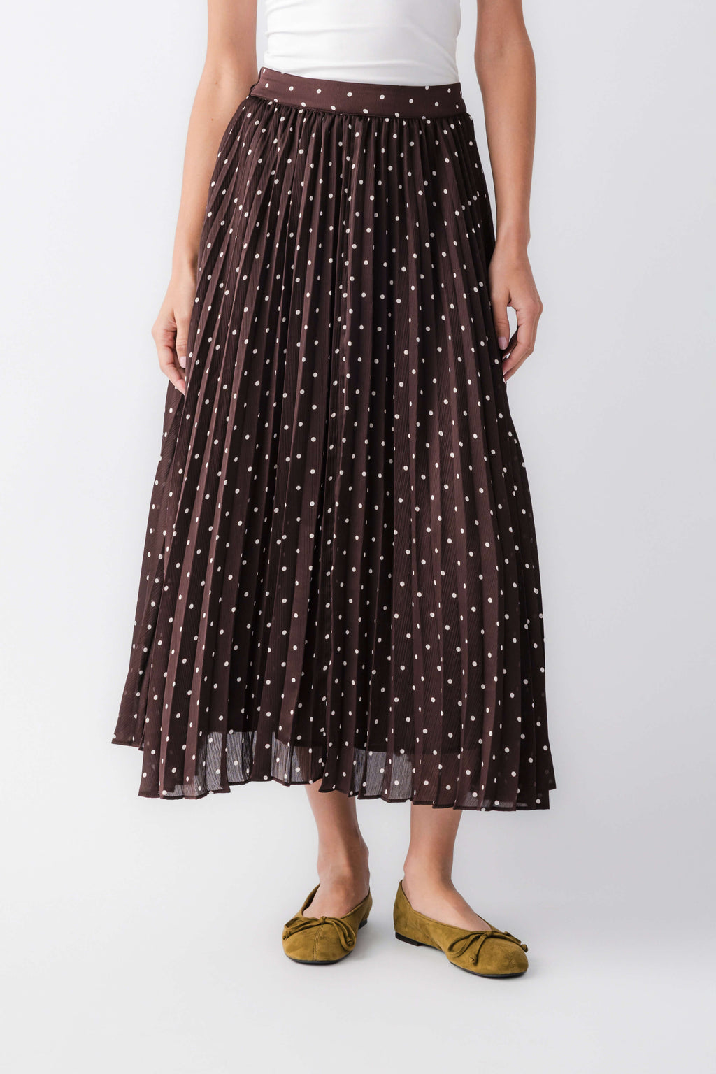 Brown polka-dot pleated maxi skirt with elastic waist, full length front view