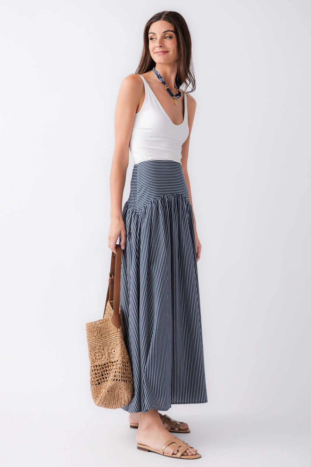 Blue-and-white striped drop-waist maxi skirt with elastic waistband and pleated tiers